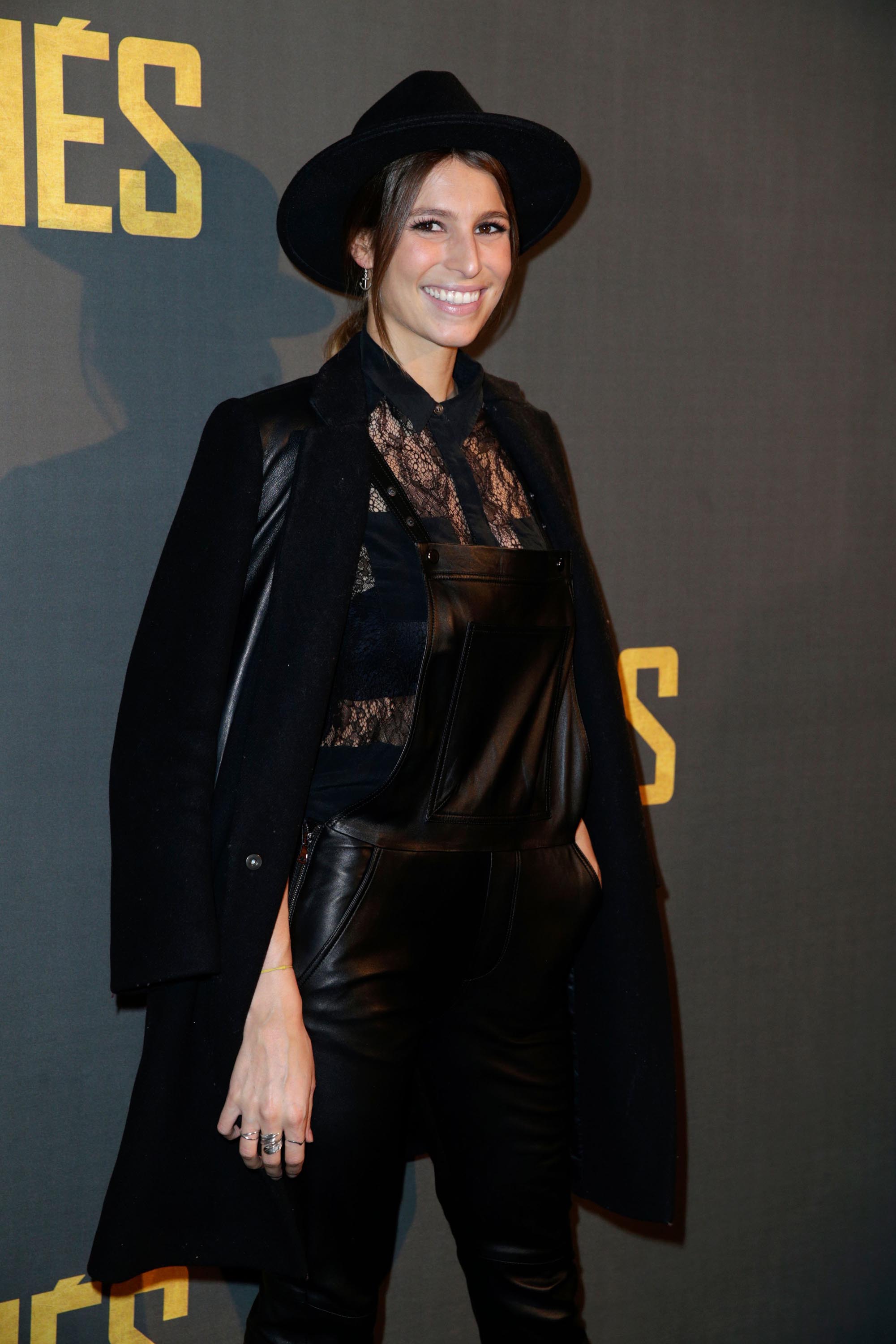 Laury Thilleman poses as she arrives for the premiere of the film ‘Allied’