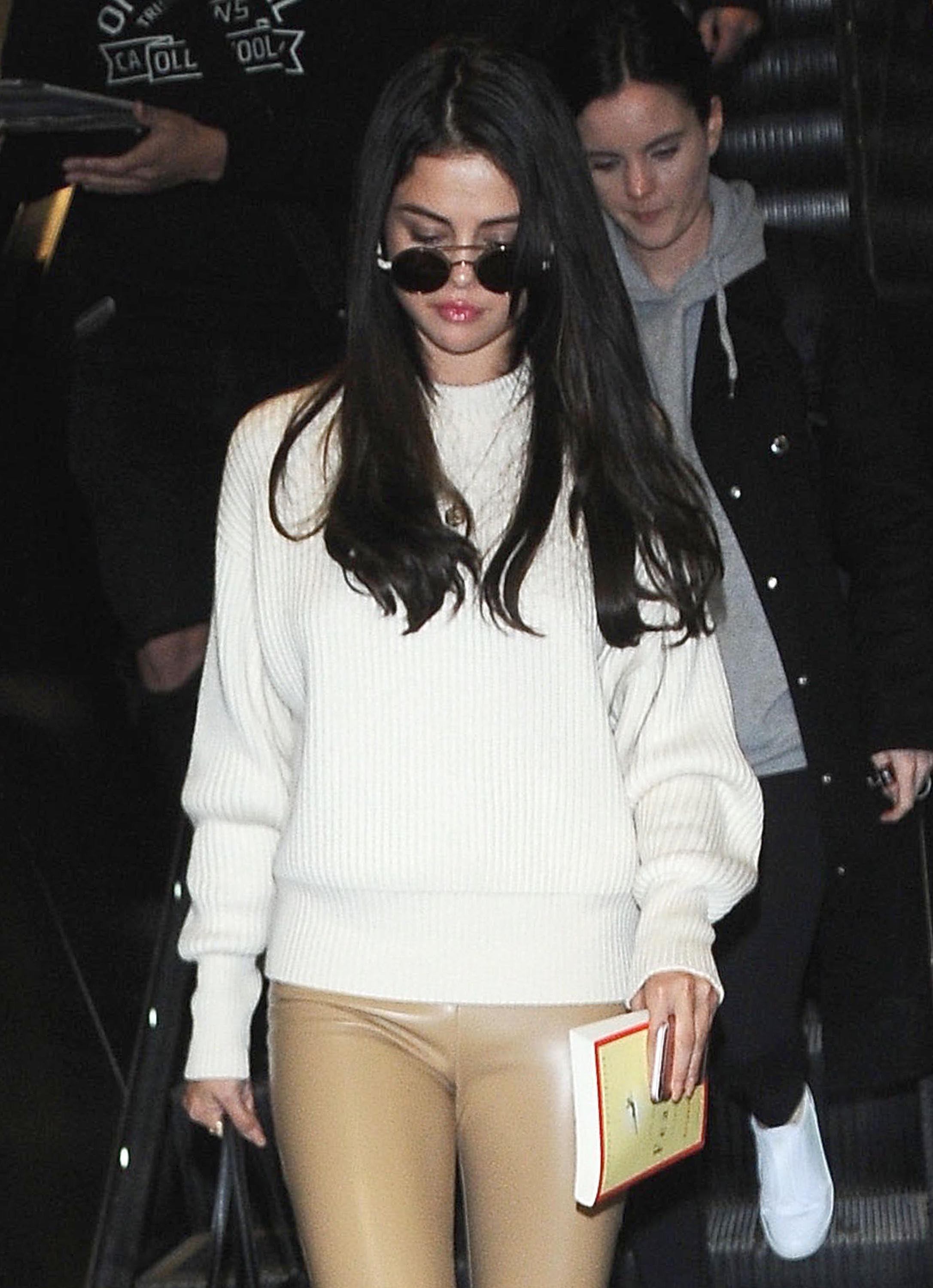 Selena Gomez arriving at LAX