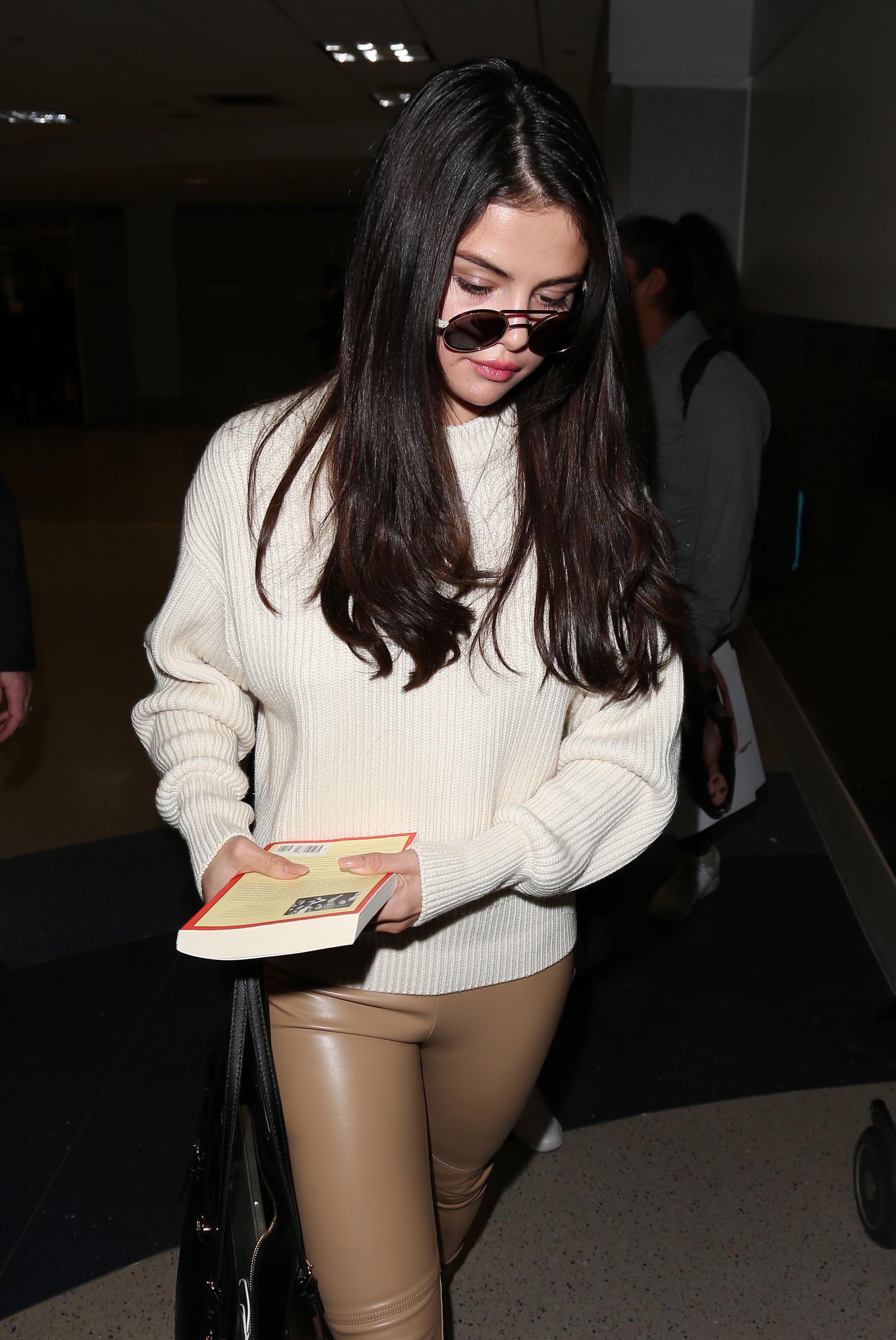 Selena Gomez arriving at LAX