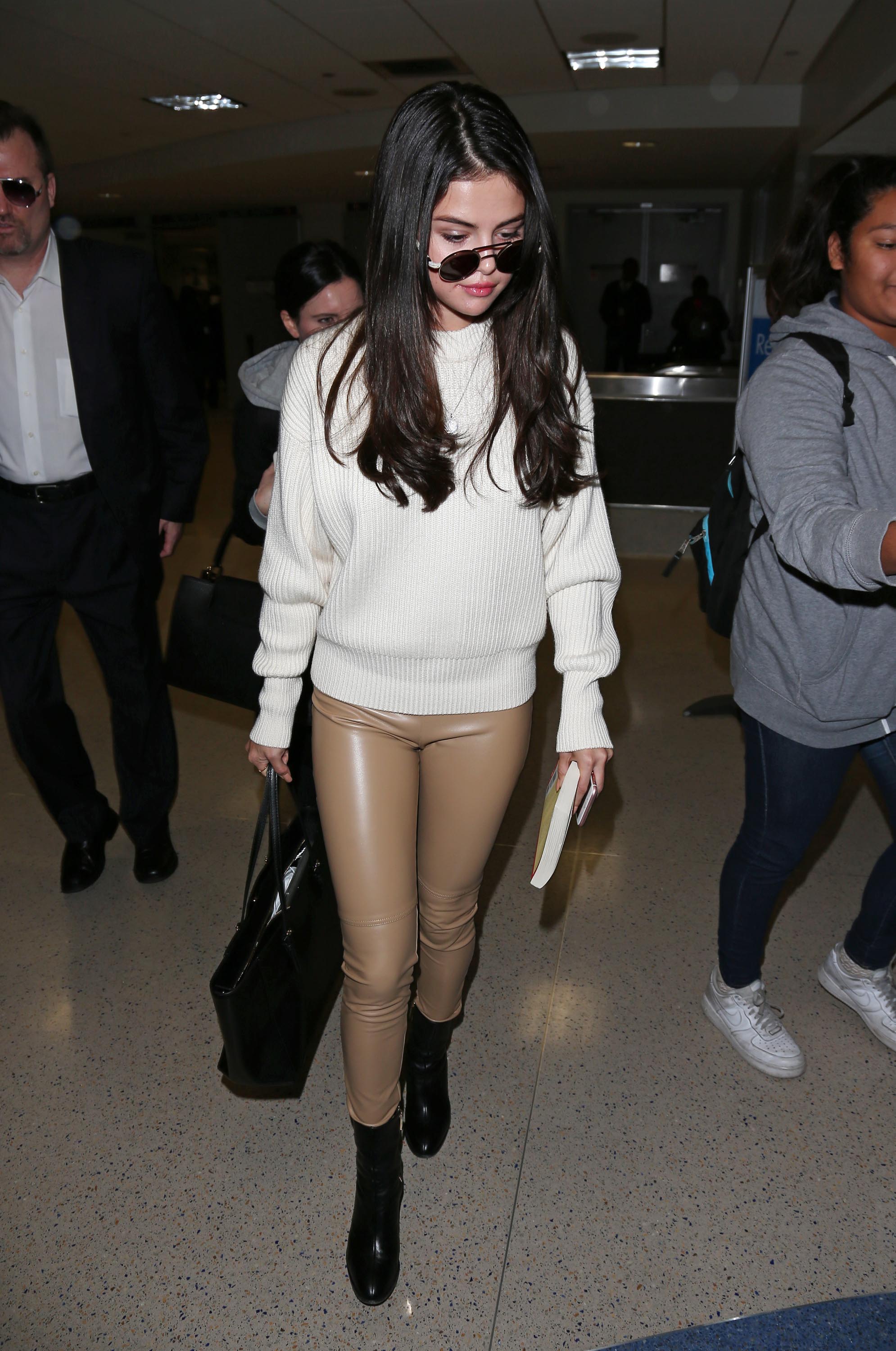 Selena Gomez arriving at LAX