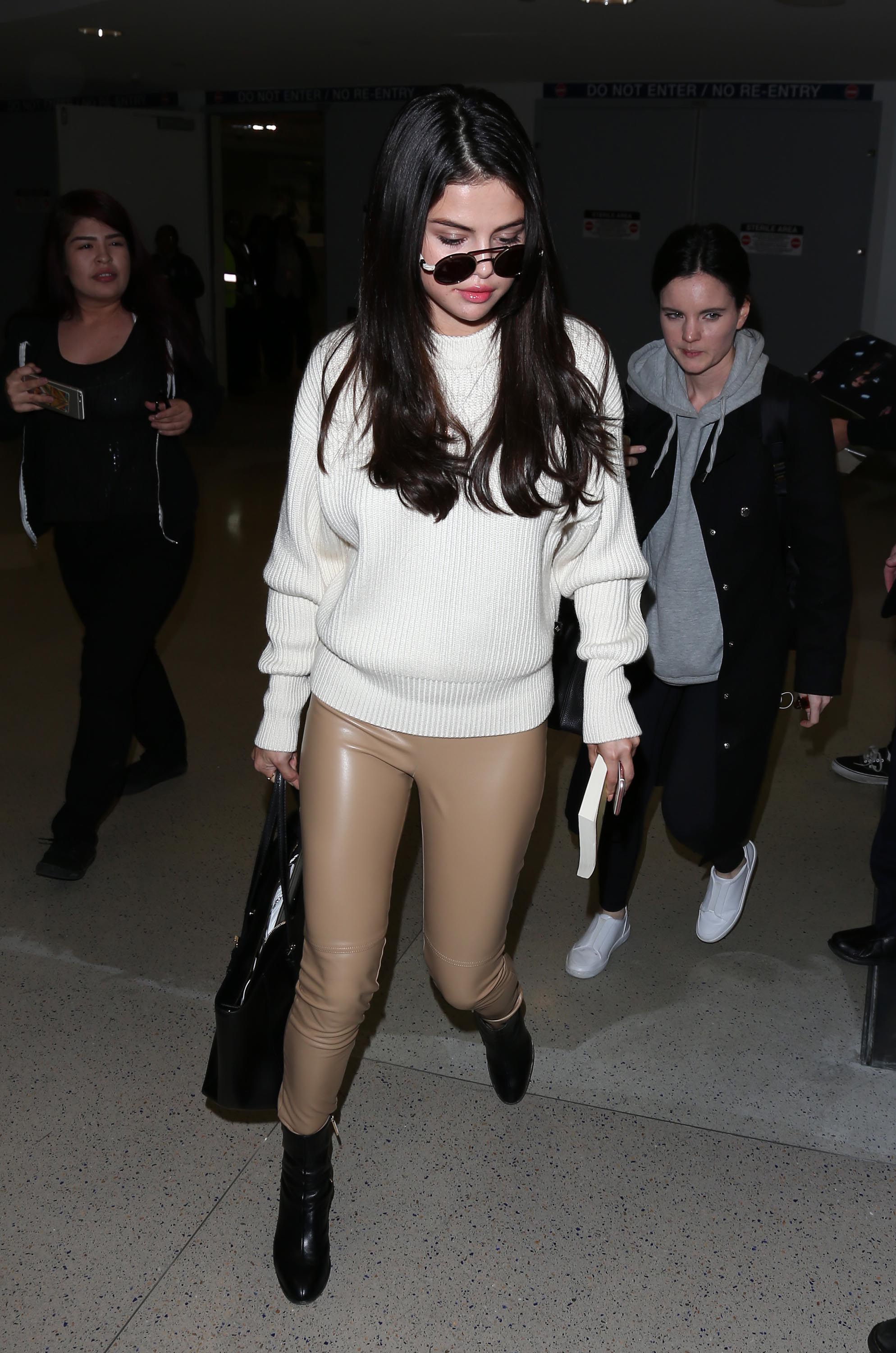 Selena Gomez arriving at LAX