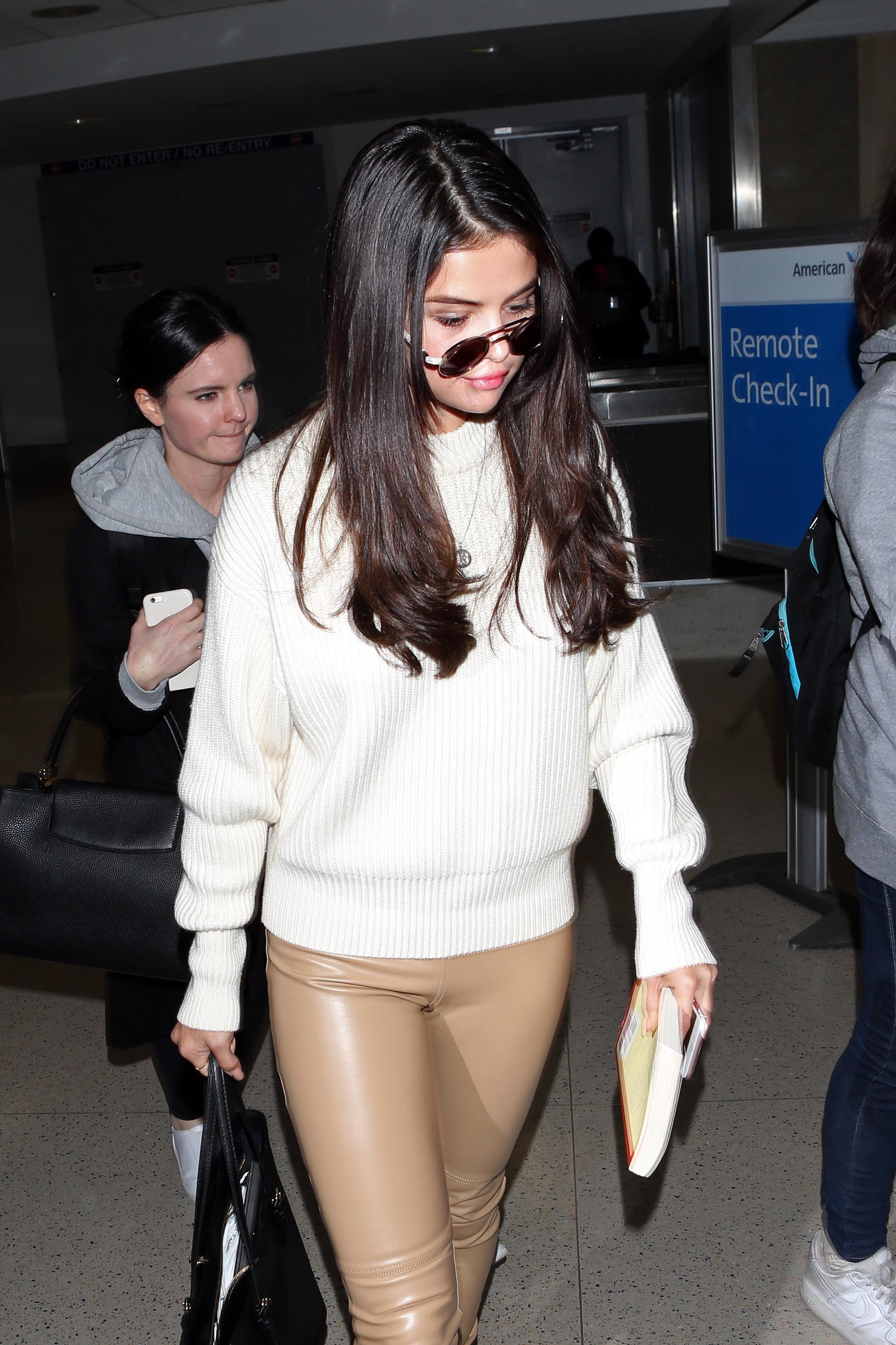 Selena Gomez arriving at LAX