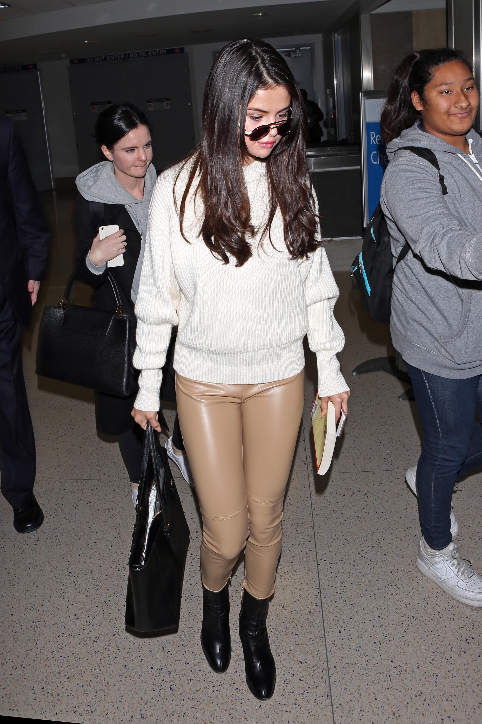 Selena Gomez arriving at LAX