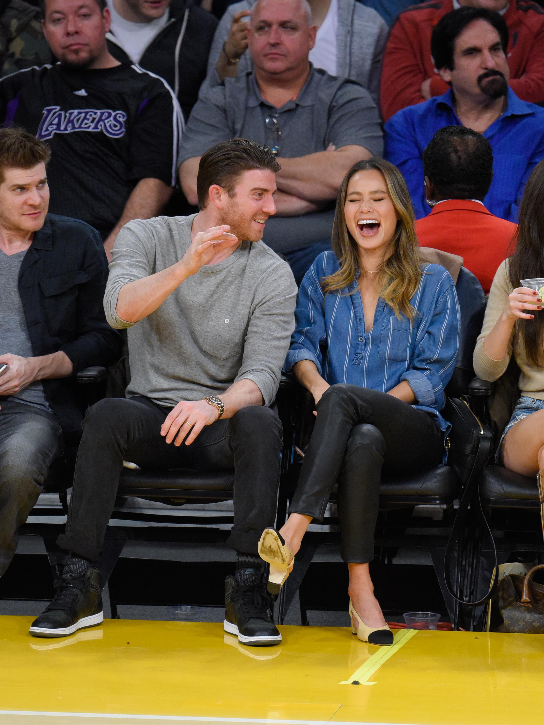 Jamie Chung attends a basketball game