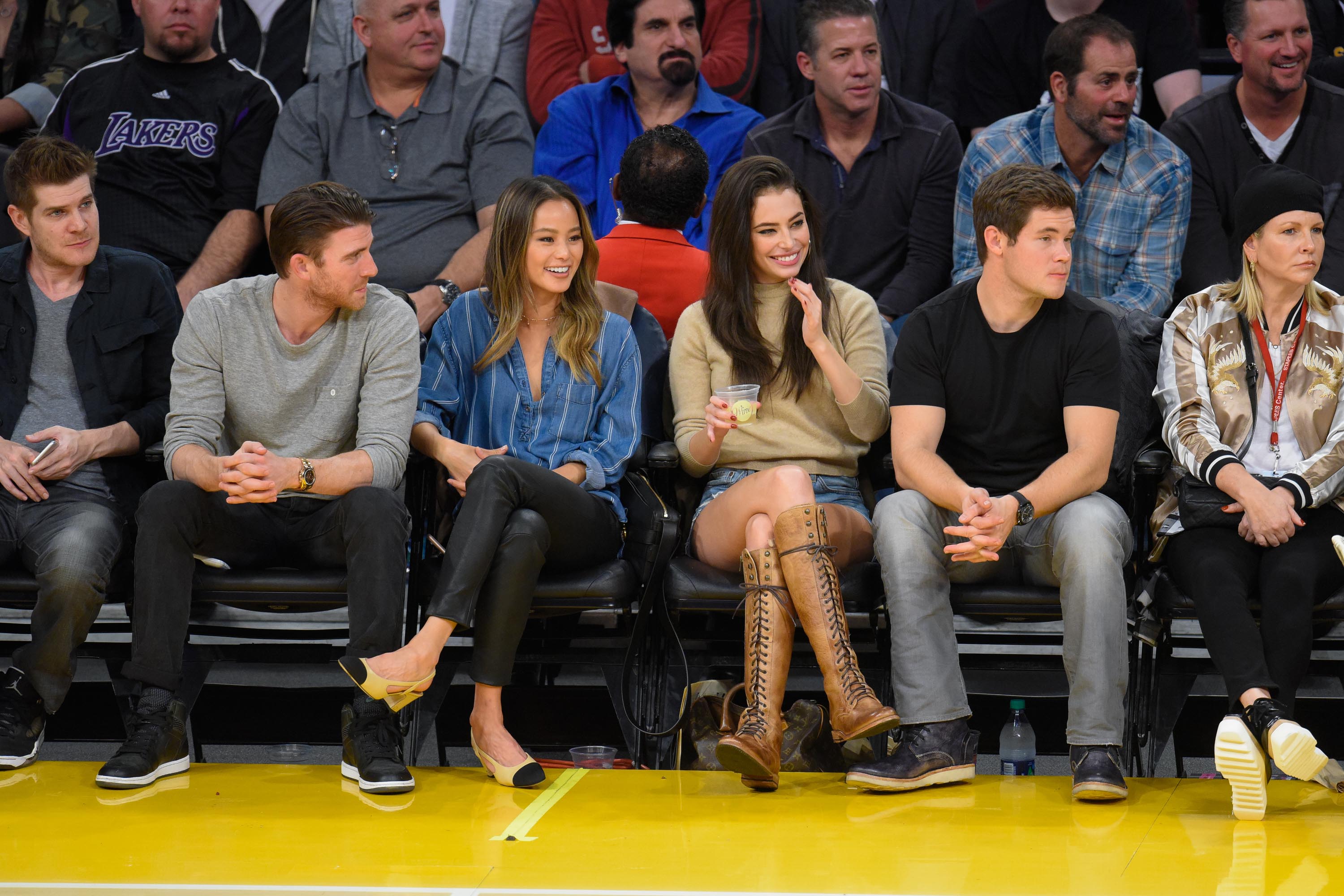 Jamie Chung attends a basketball game