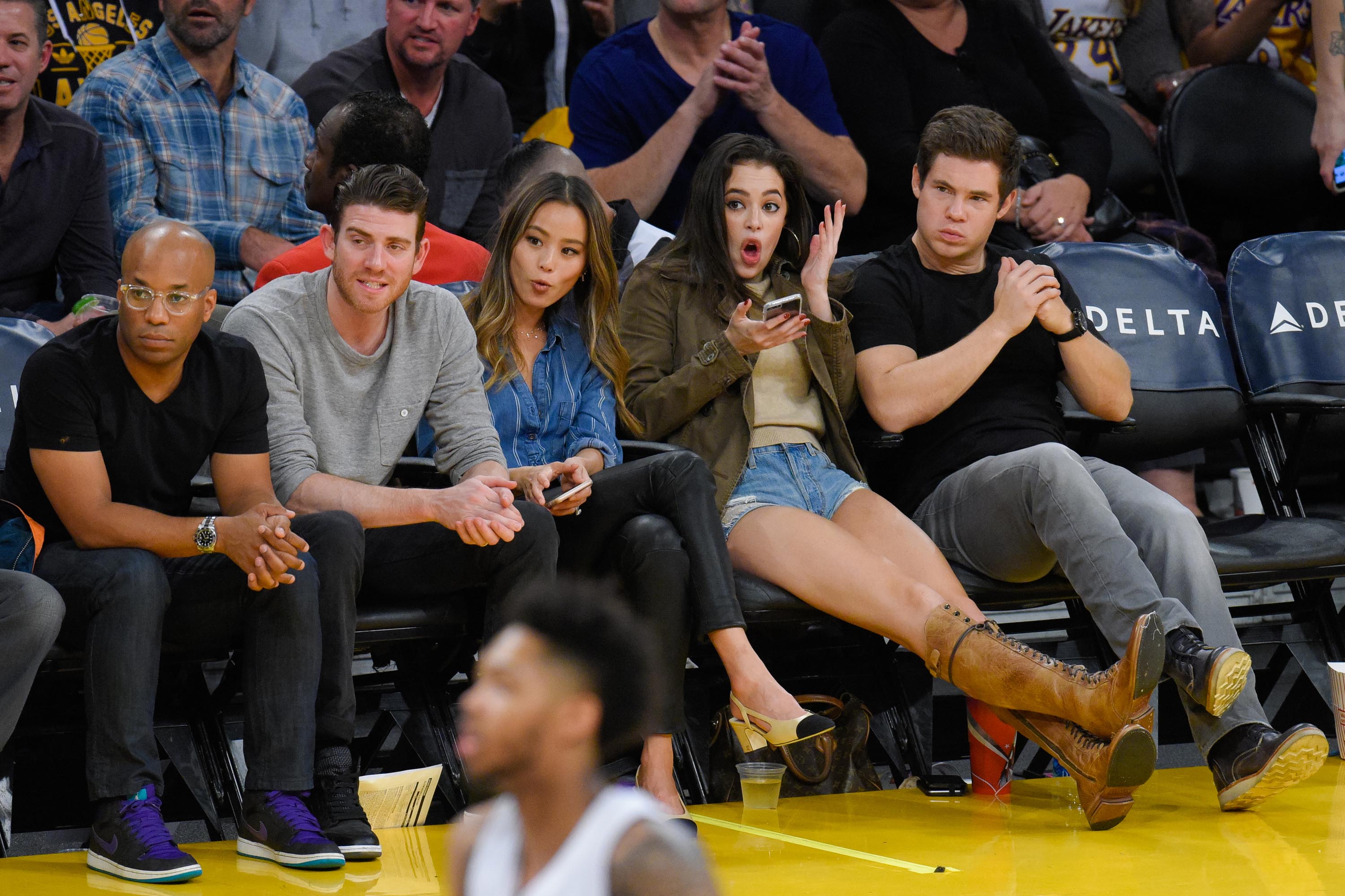 Jamie Chung attends a basketball game