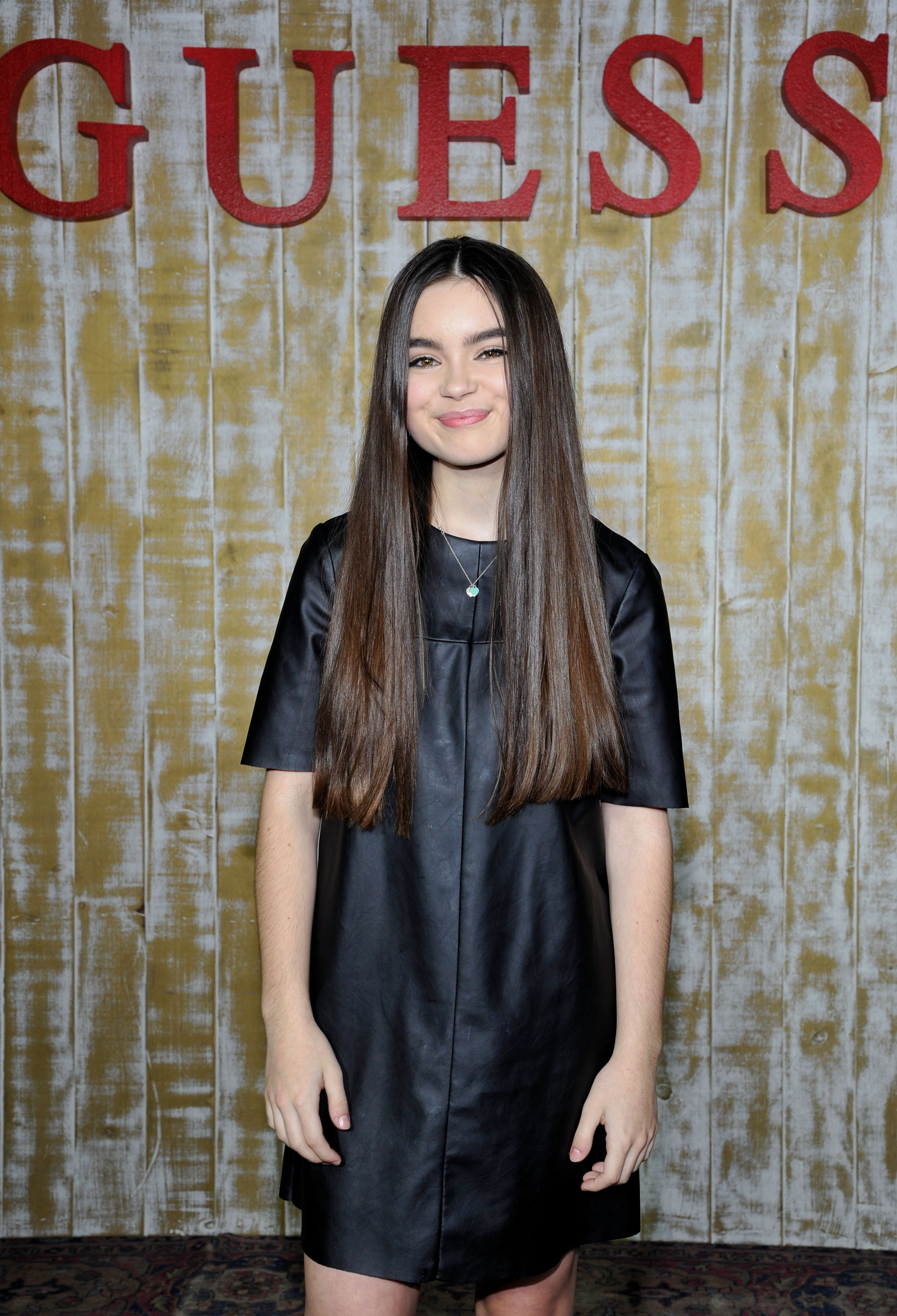 Landry Bender attends GUESS Glitz and Glam Holiday event