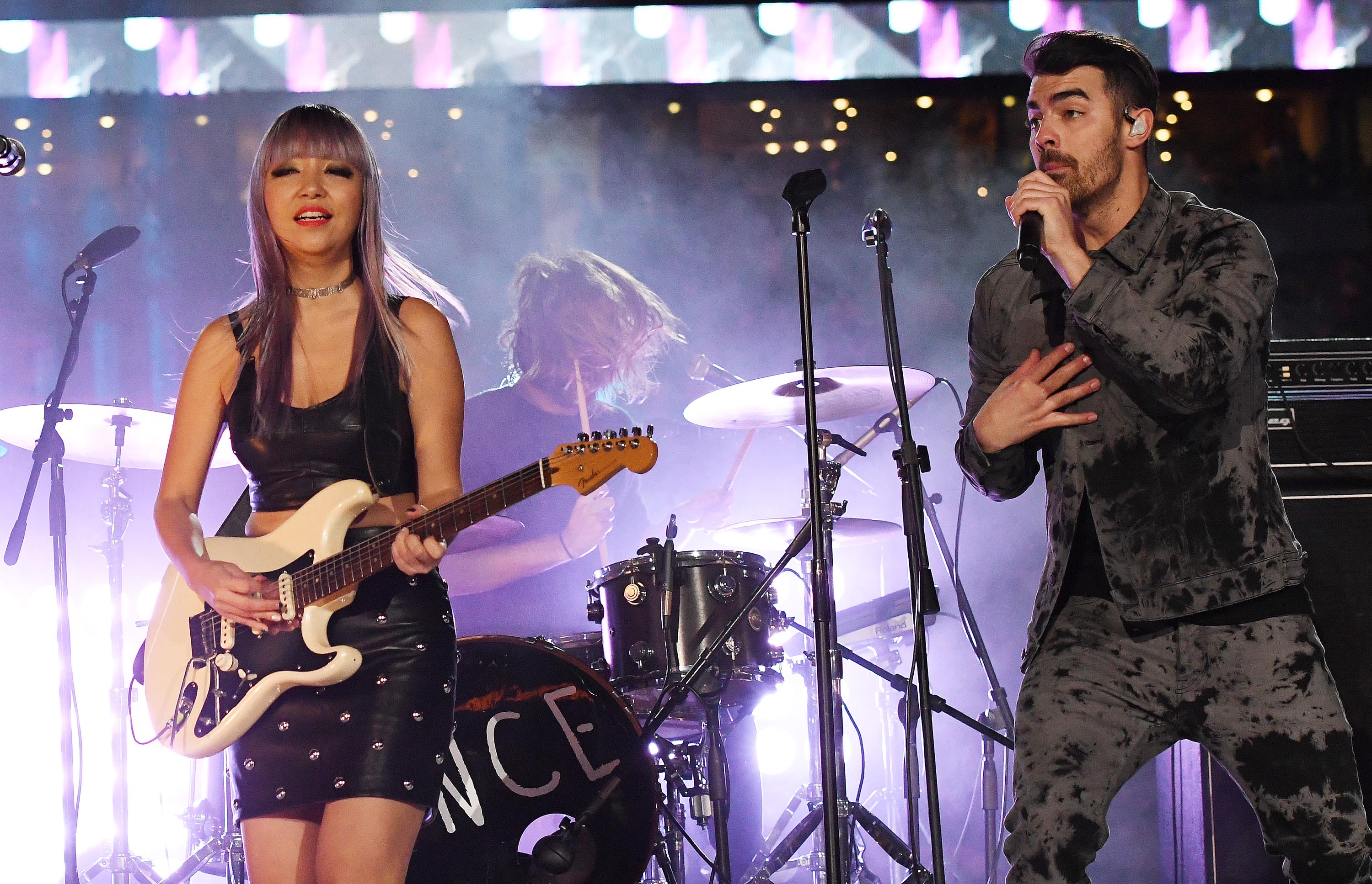 JinJoo Lee performs during the half time show