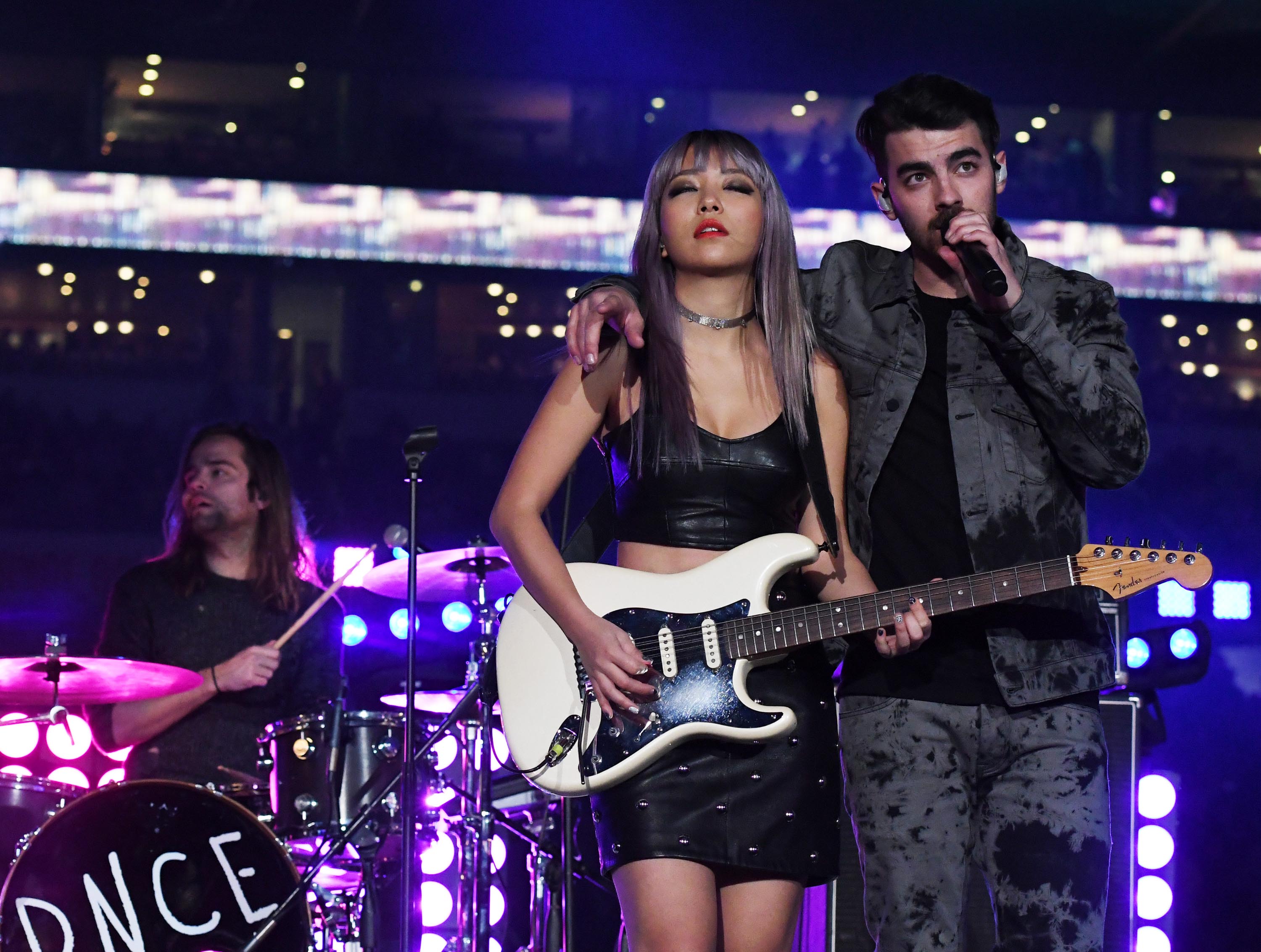 JinJoo Lee performs during the half time show