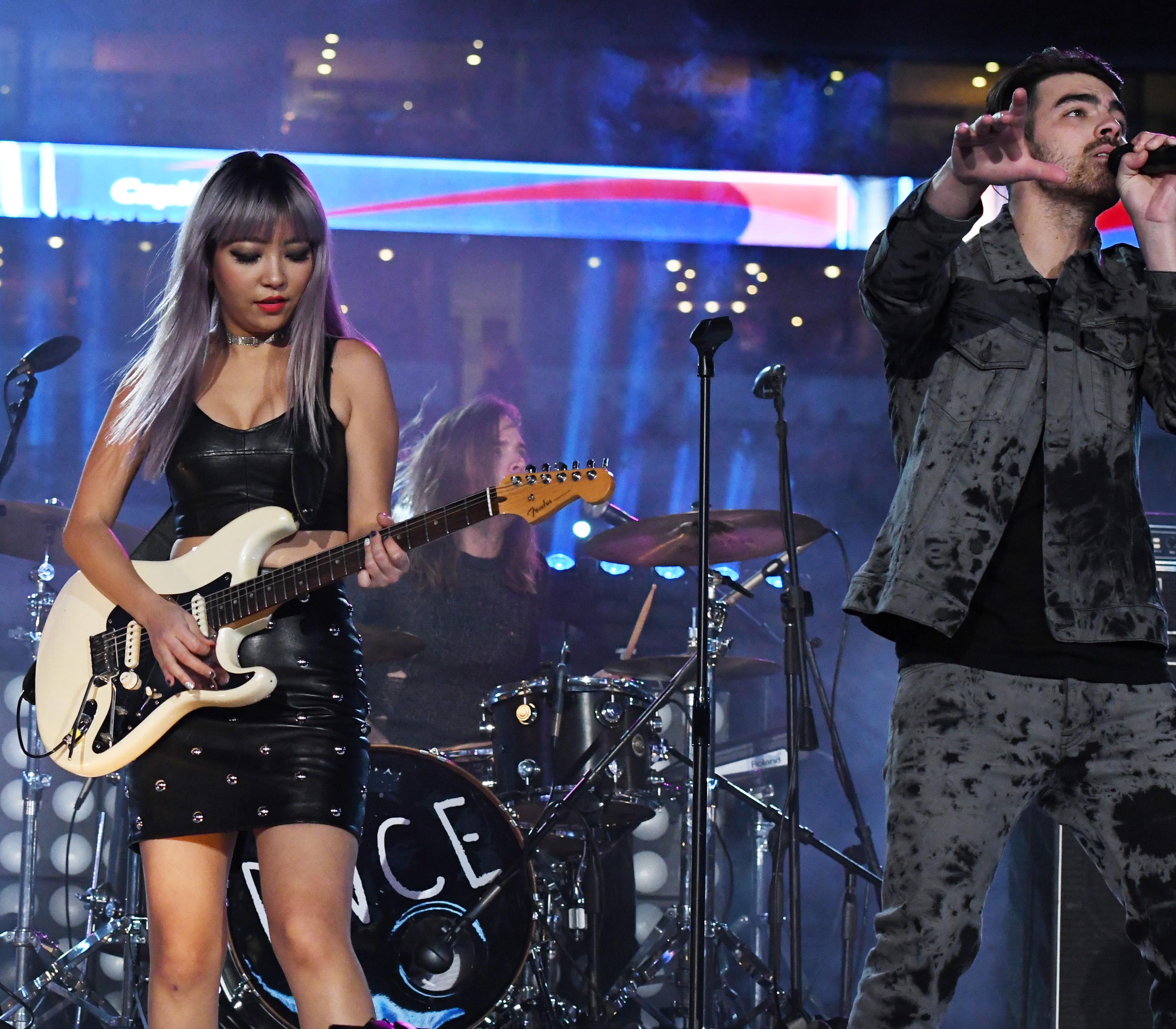 JinJoo Lee performs during the half time show