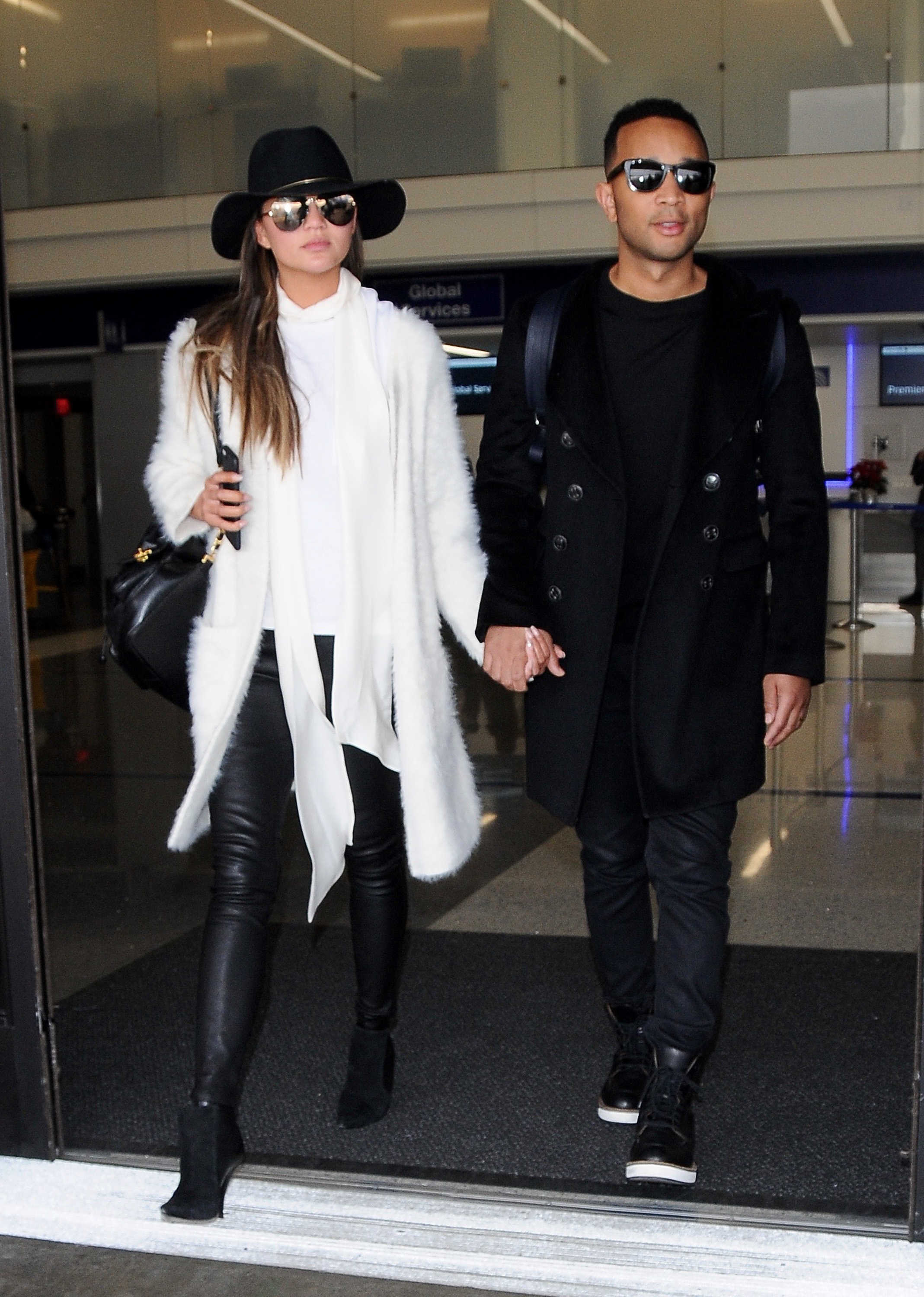 Chrissy Teigen arriving at LAX