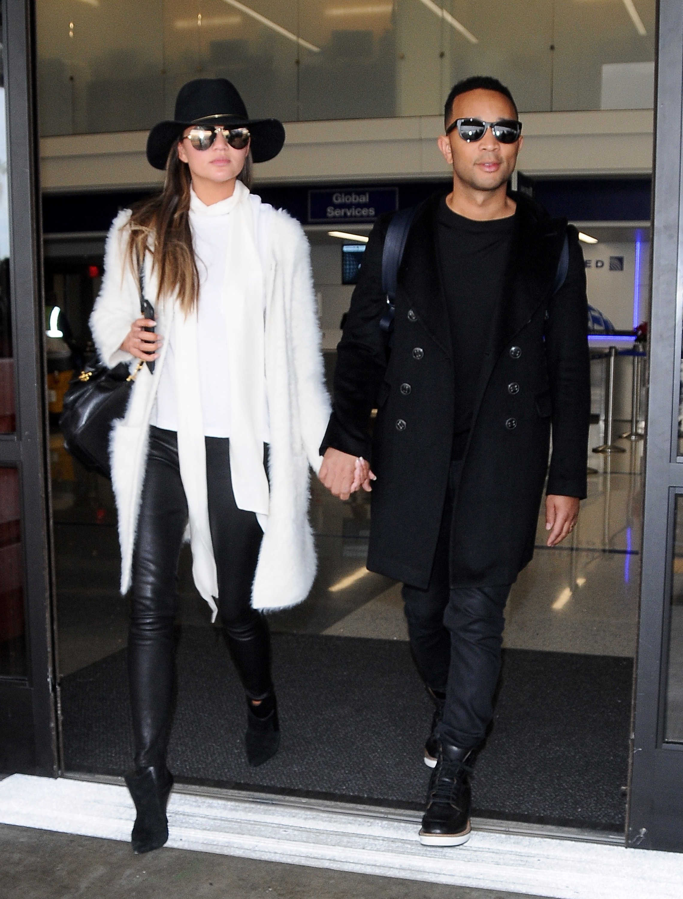 Chrissy Teigen arriving at LAX