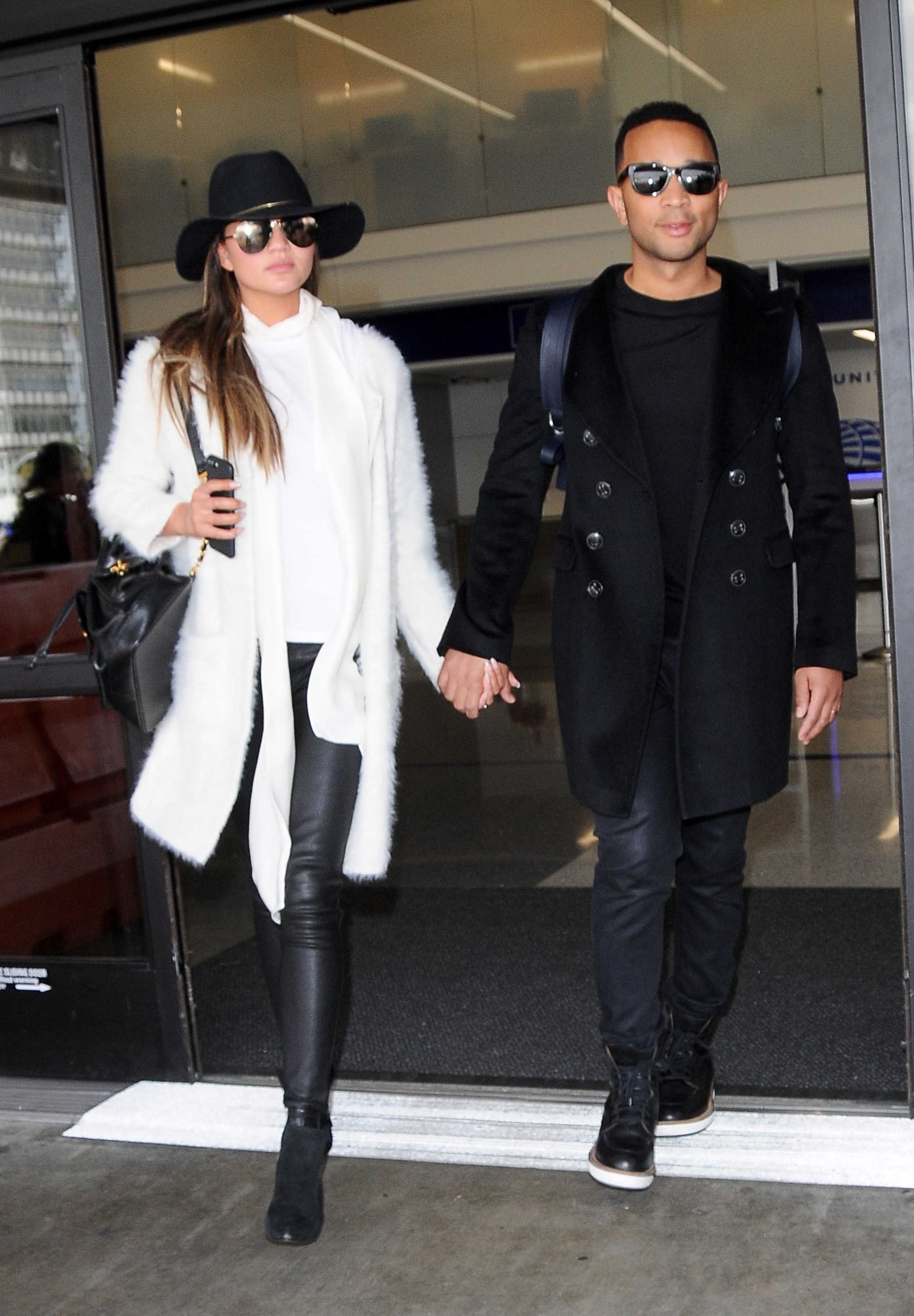 Chrissy Teigen arriving at LAX