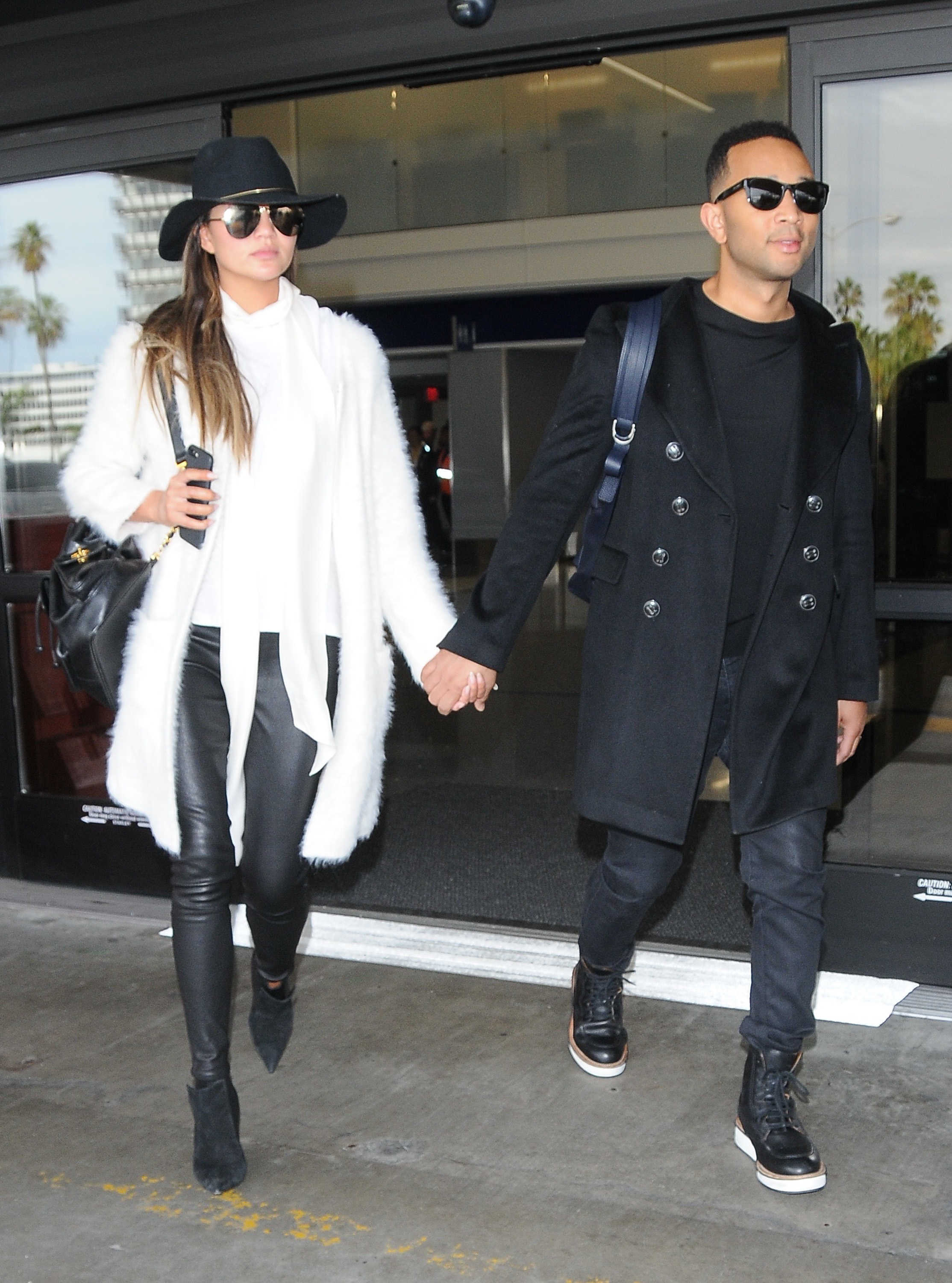 Chrissy Teigen arriving at LAX