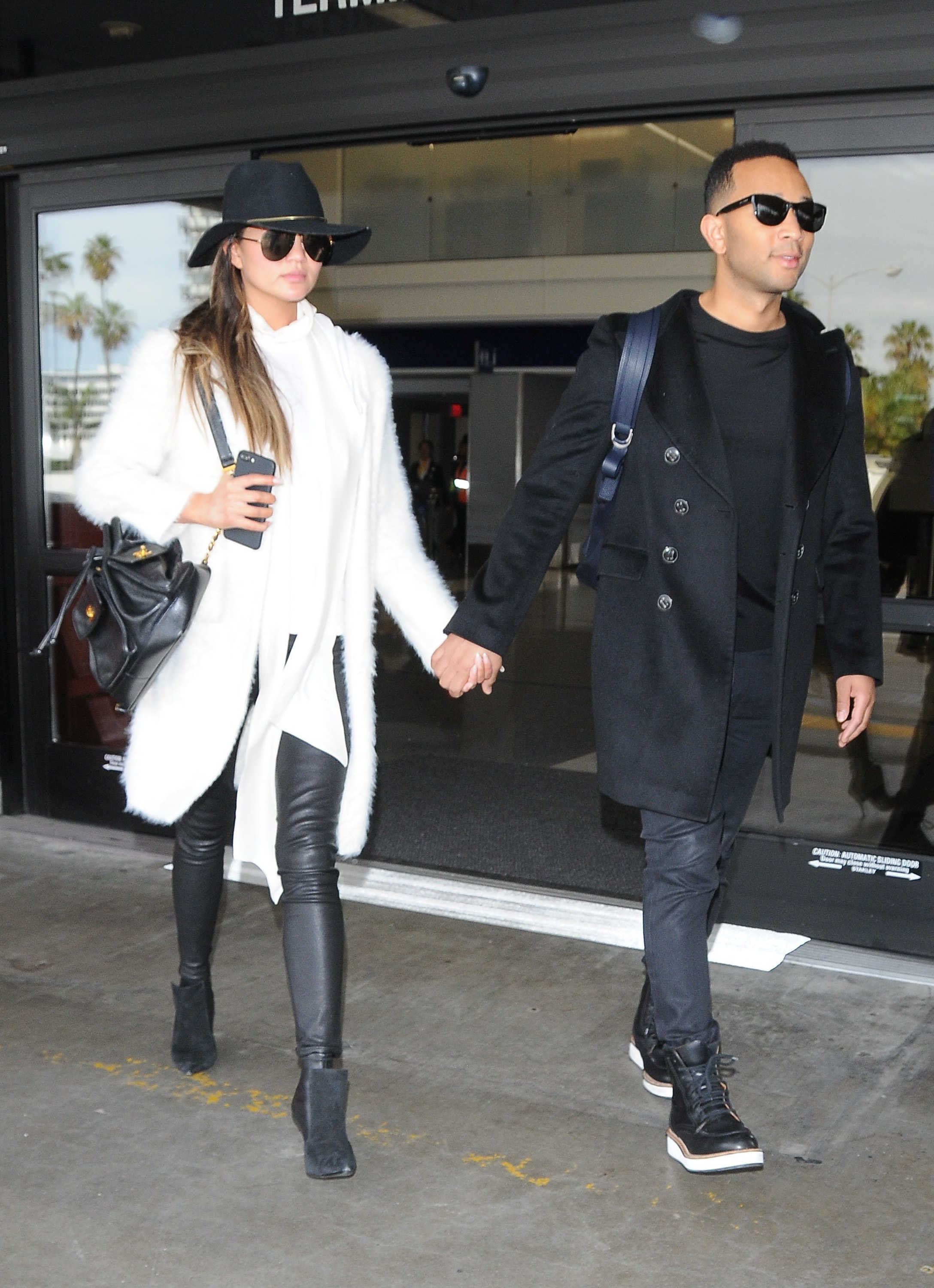 Chrissy Teigen arriving at LAX