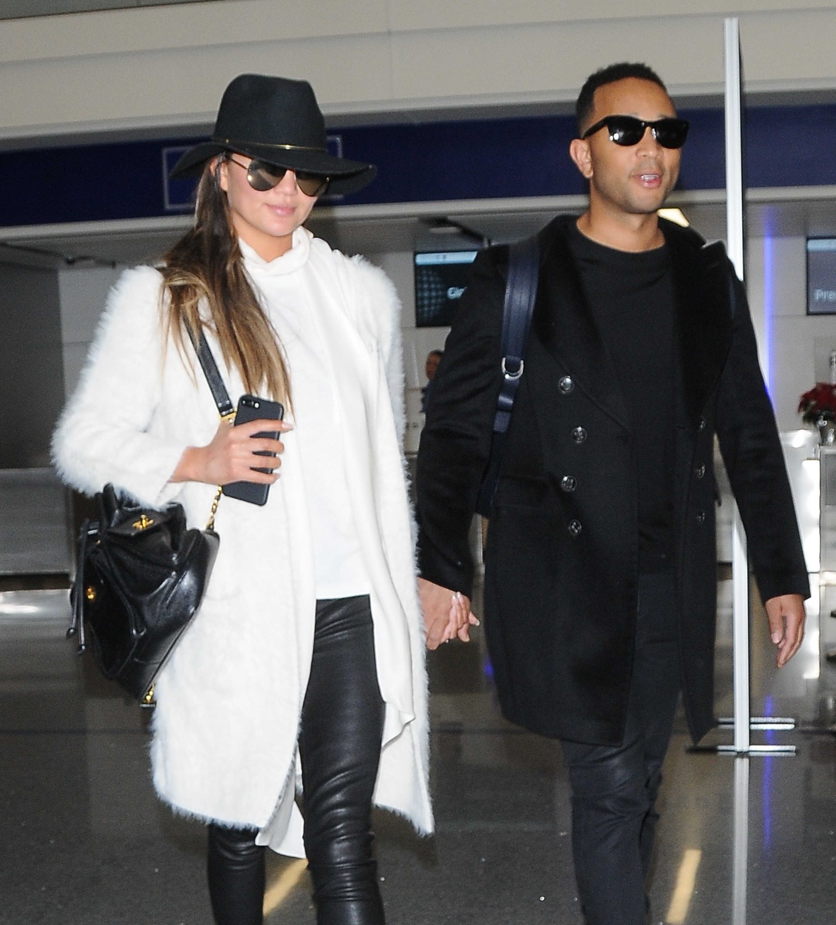 Chrissy Teigen arriving at LAX