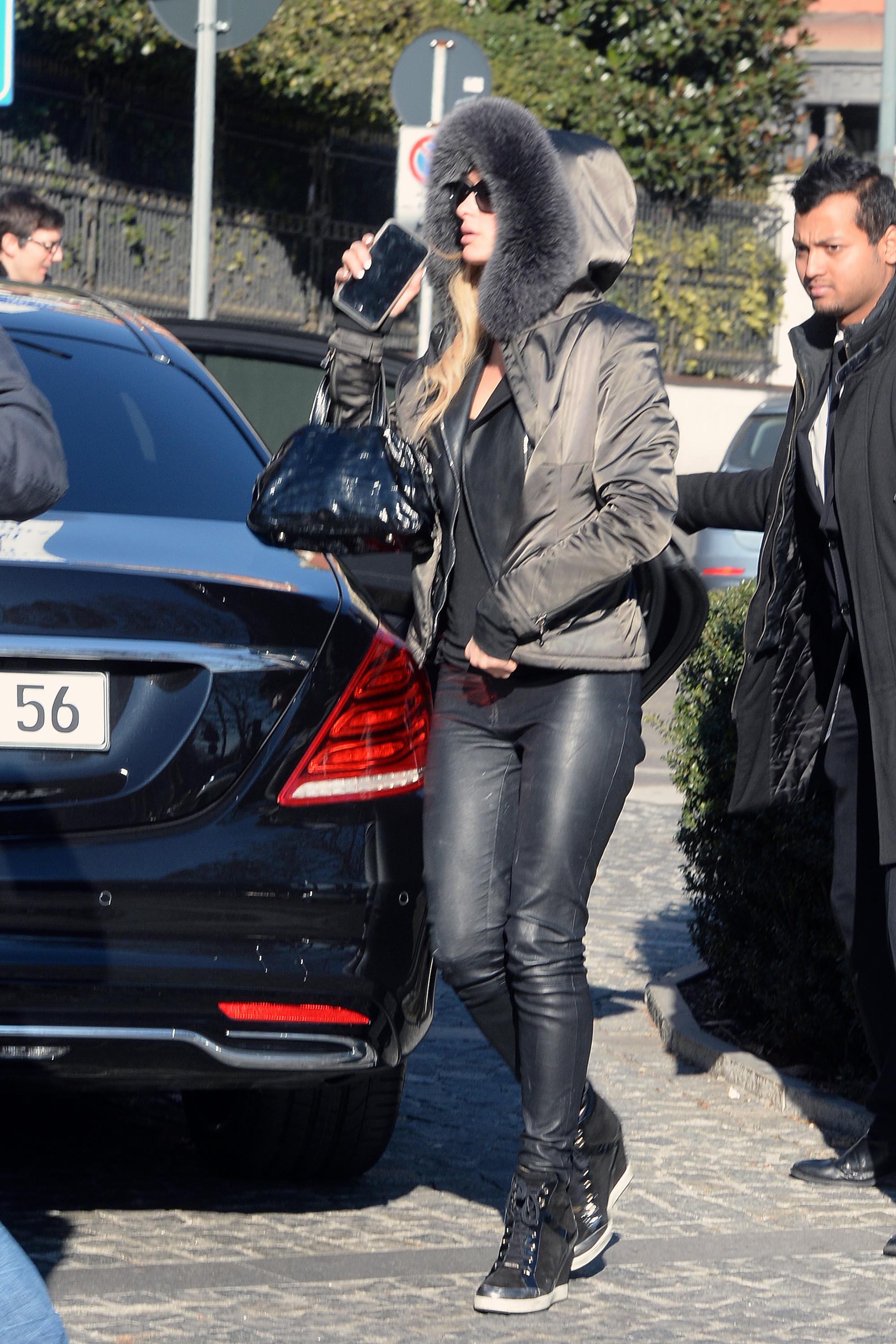 Paris Hilton arrives at her hotel in Milan
