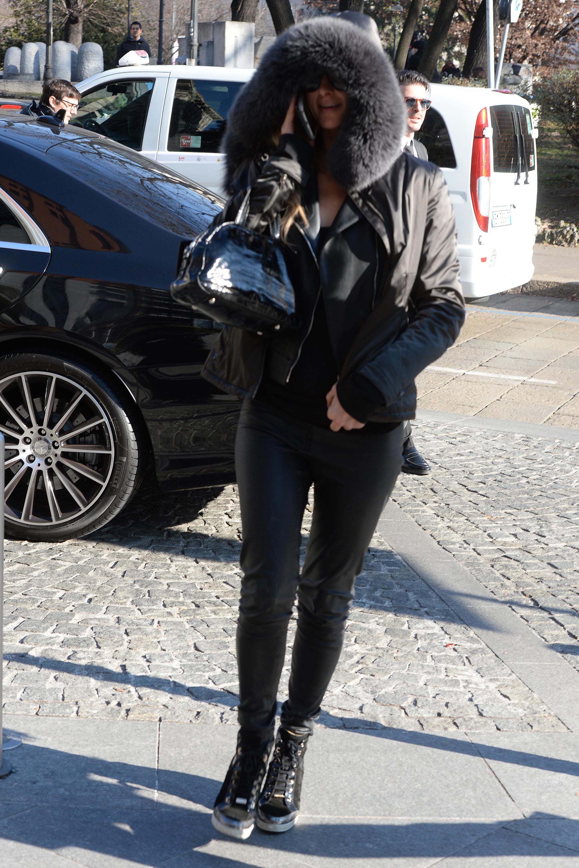 Paris Hilton arrives at her hotel in Milan