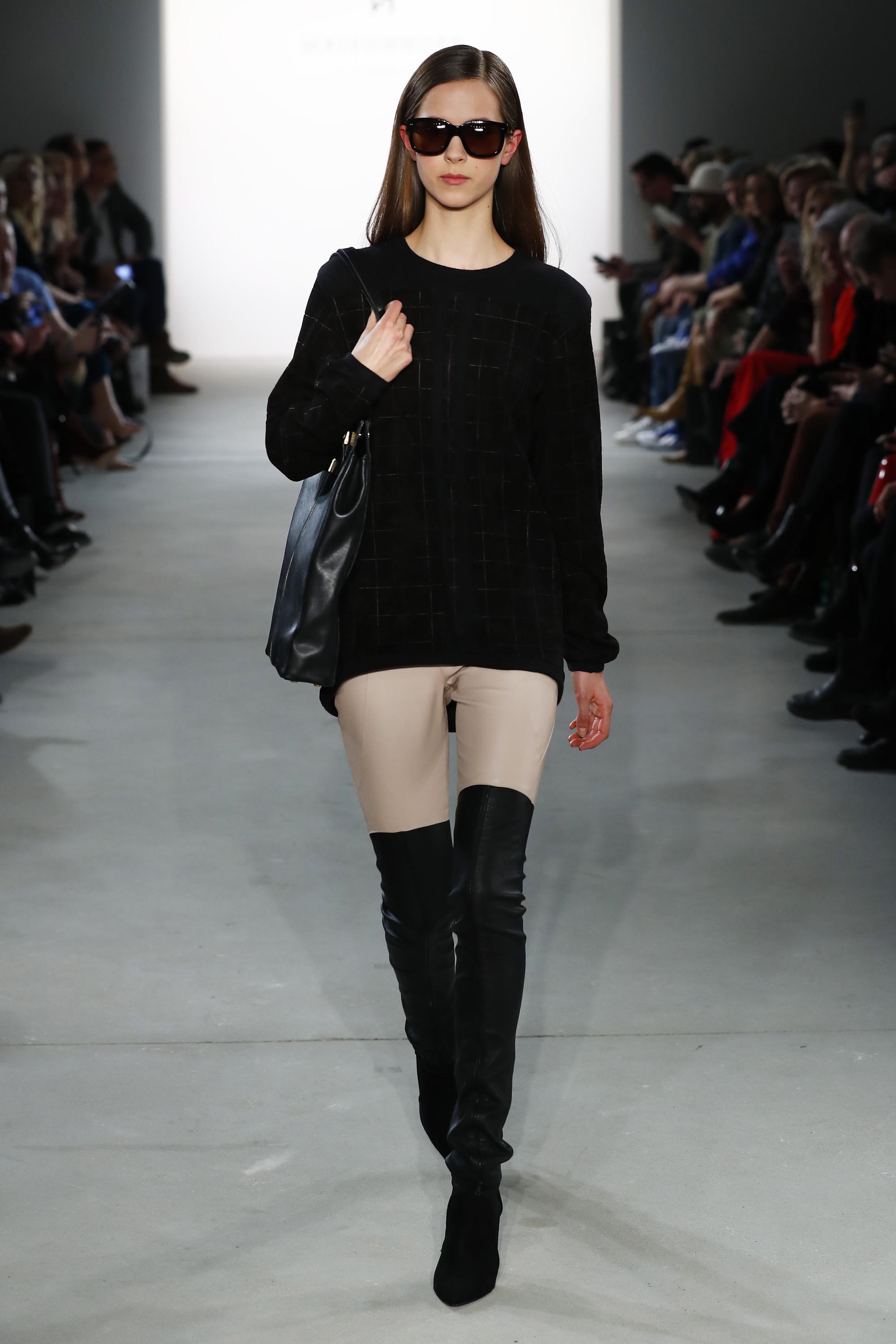 Models walk the runway at the Maisonnoee show