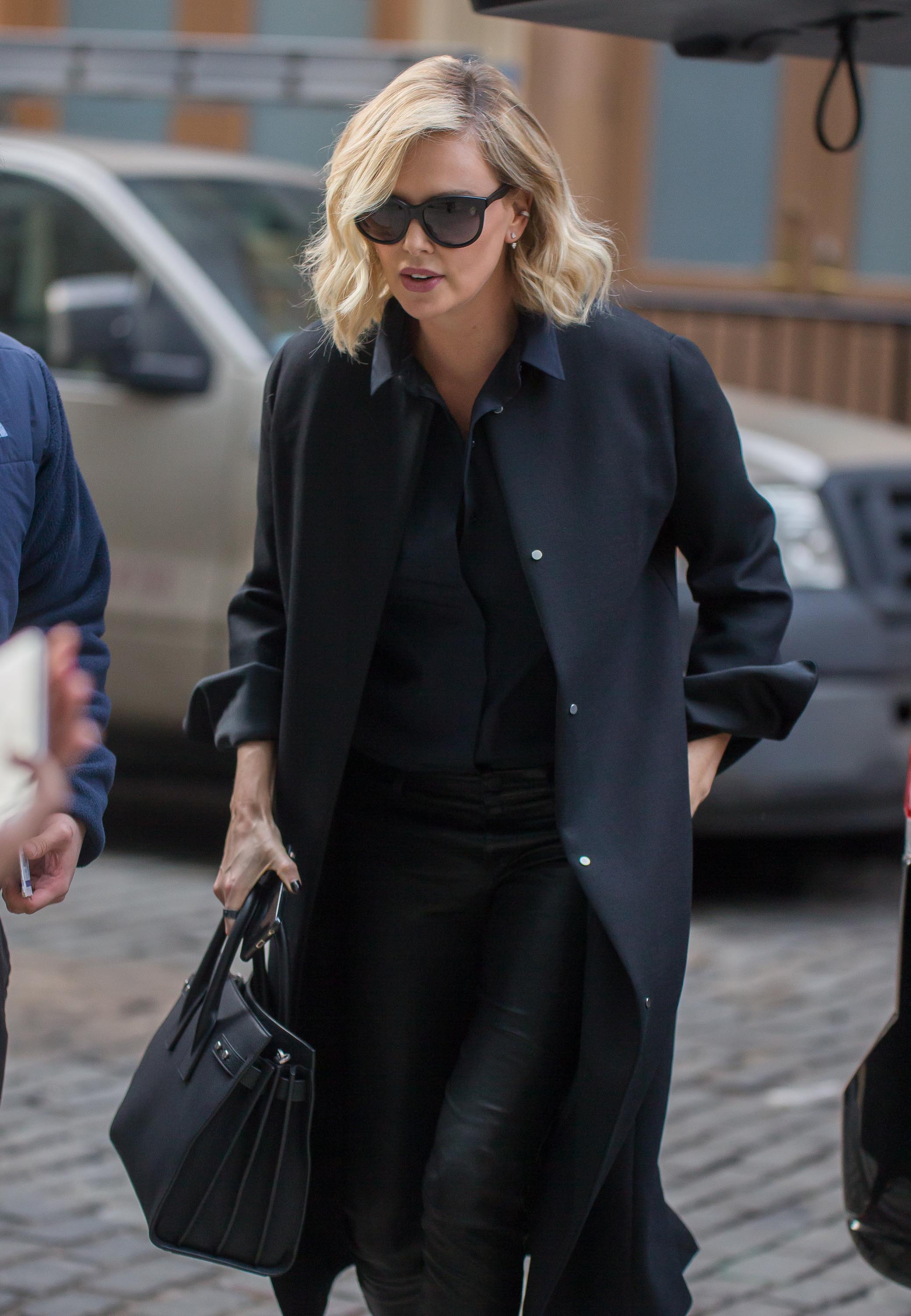Charlize Theron leaves her Hotel