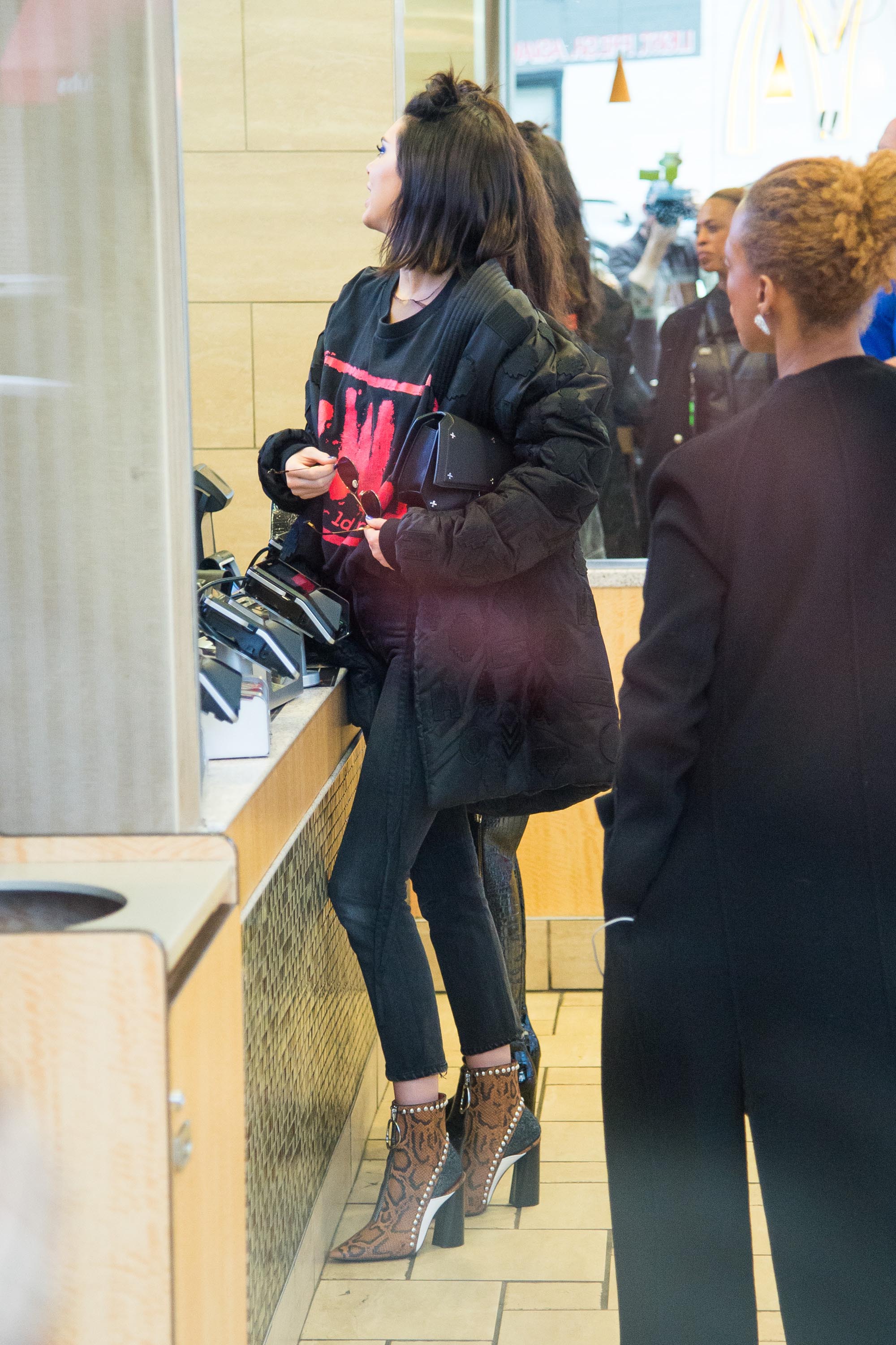 Bella Hadid attends the Michael Kors Collection Fall 2017 runway show