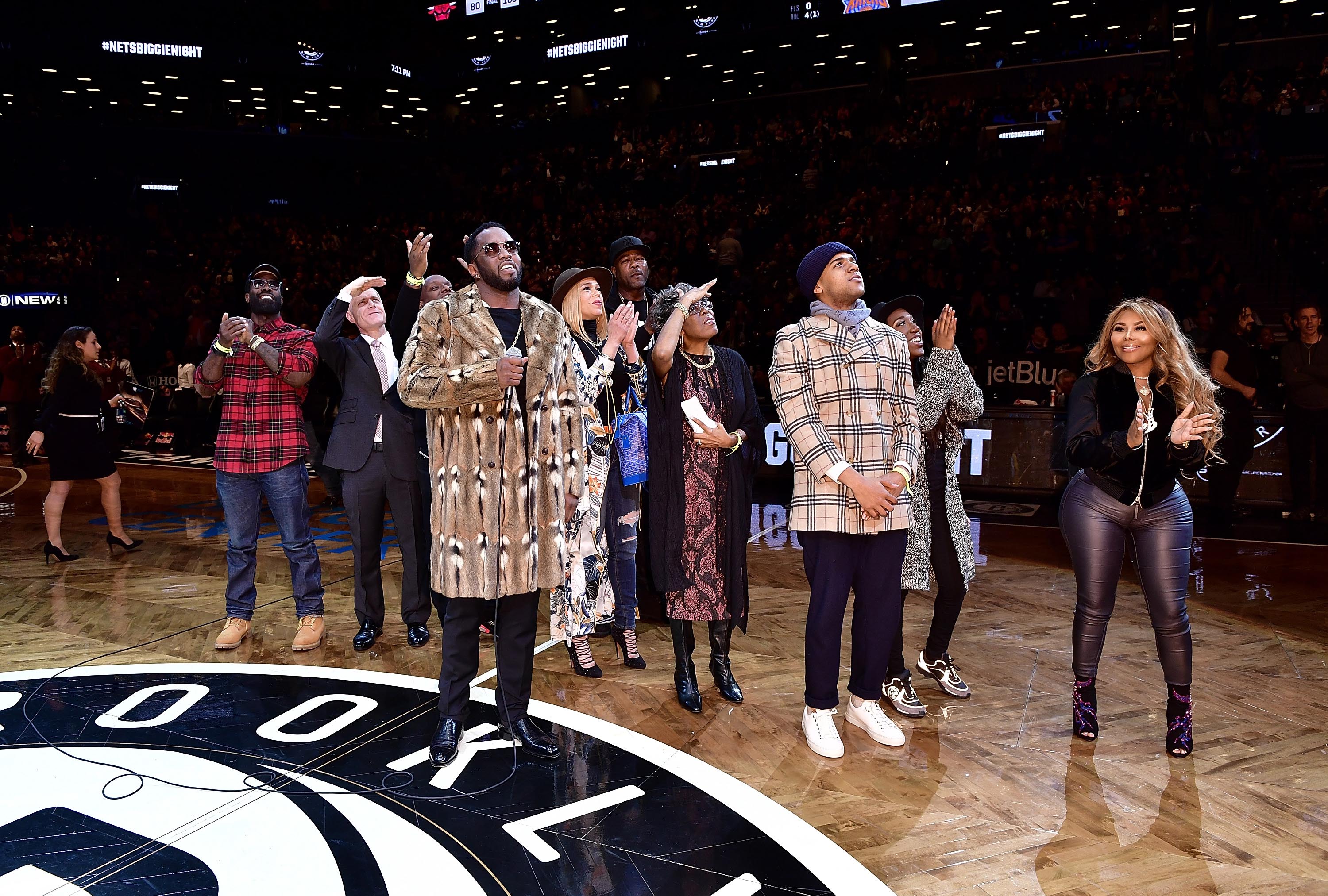 Lil’ Kim attends New York Knicks Vs. Brooklyn Nets game