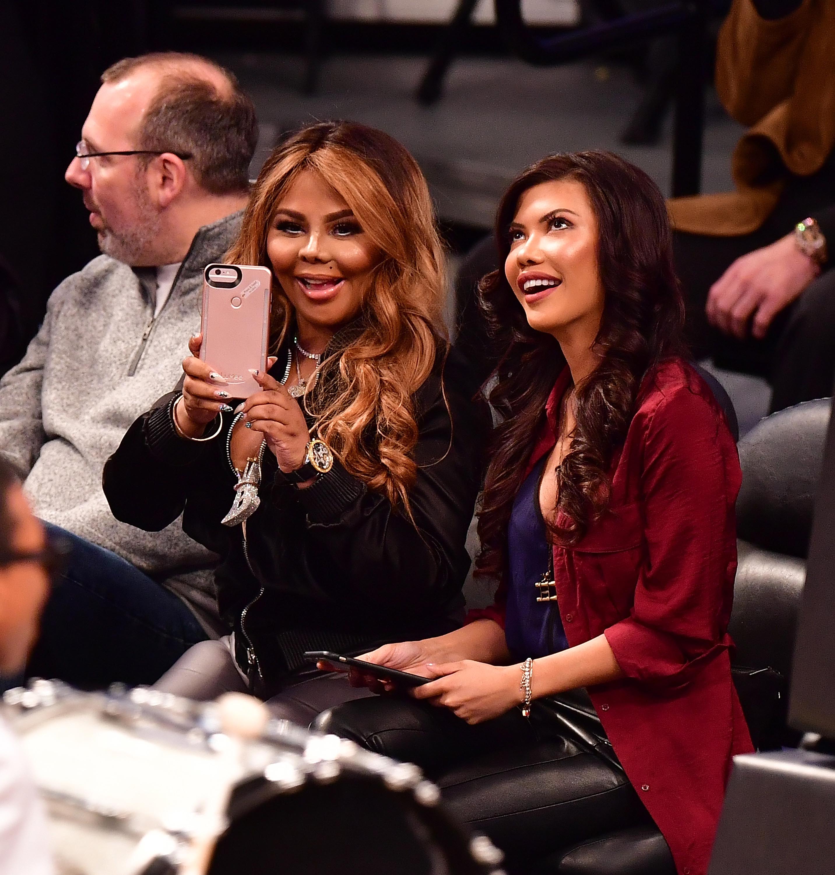 Lil’ Kim attends New York Knicks Vs. Brooklyn Nets game