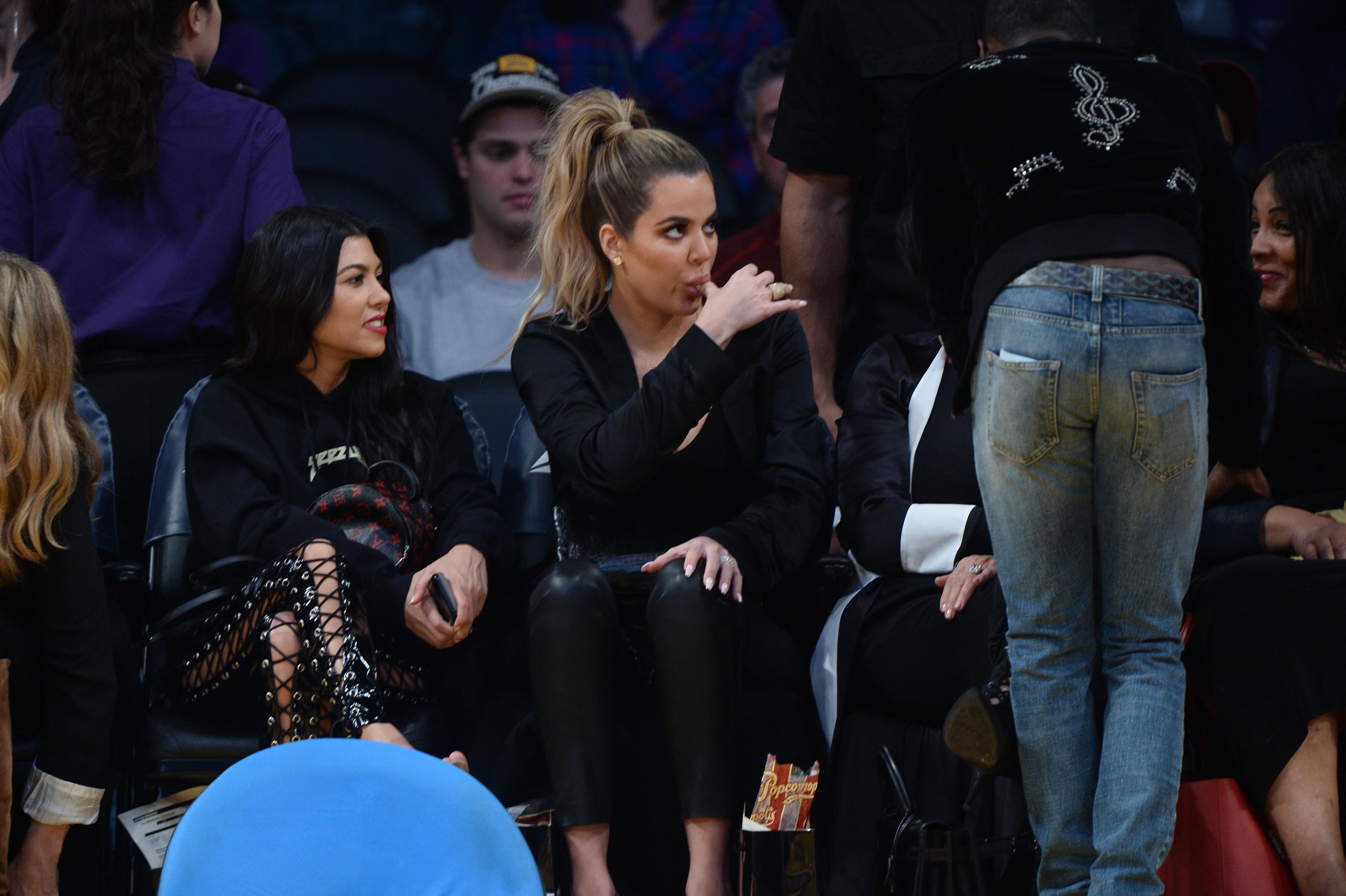 Kourtney & Khloe Kardashian attend LA Lakers vs Cavaliers Game