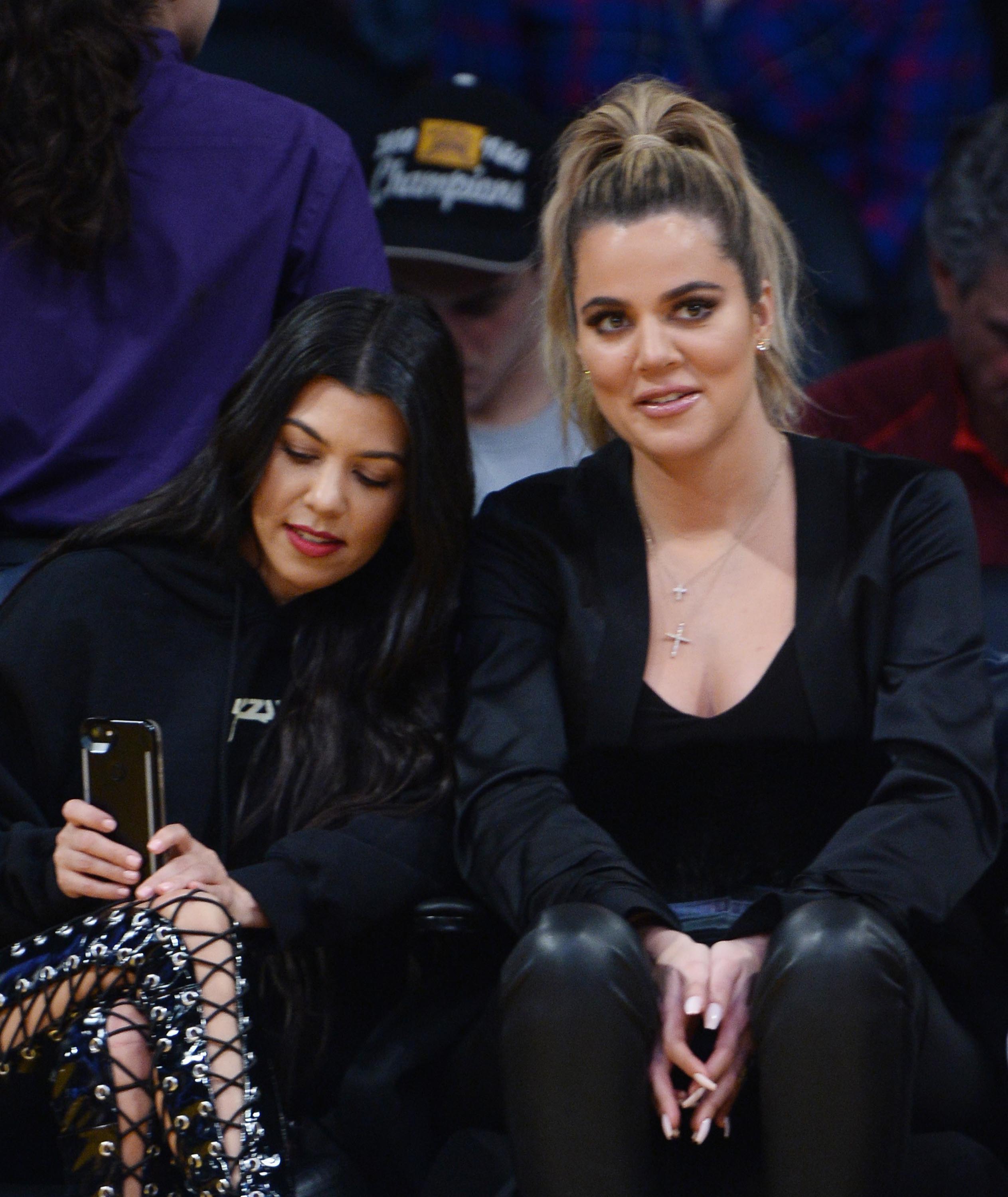 Kourtney & Khloe Kardashian attend LA Lakers vs Cavaliers Game