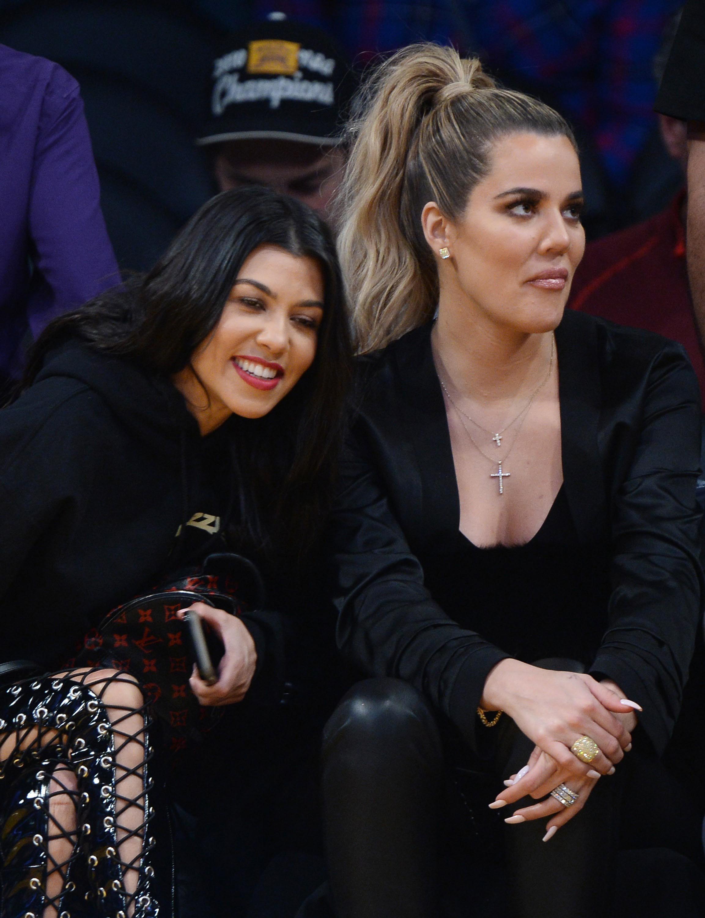 Kourtney & Khloe Kardashian attend LA Lakers vs Cavaliers Game