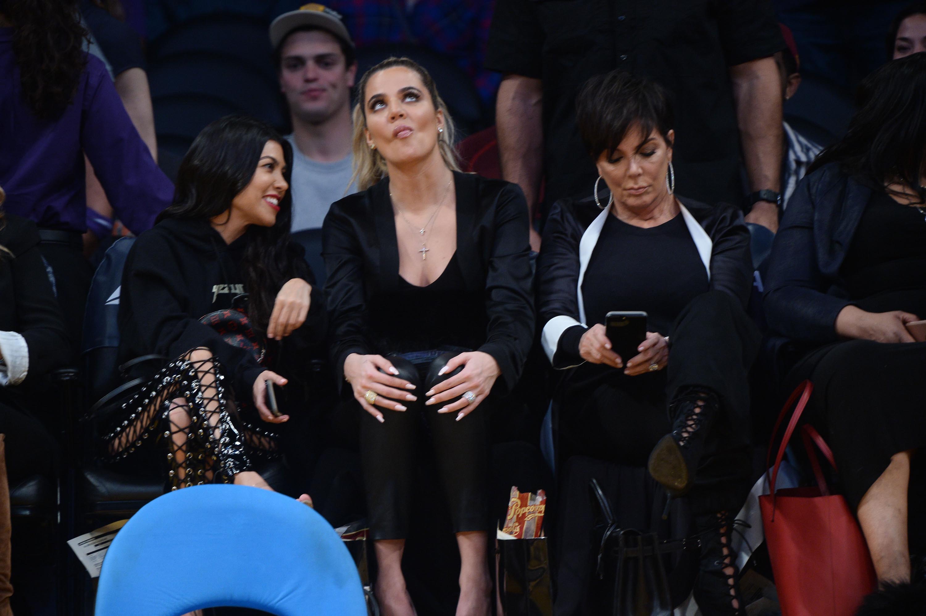 Kourtney & Khloe Kardashian attend LA Lakers vs Cavaliers Game