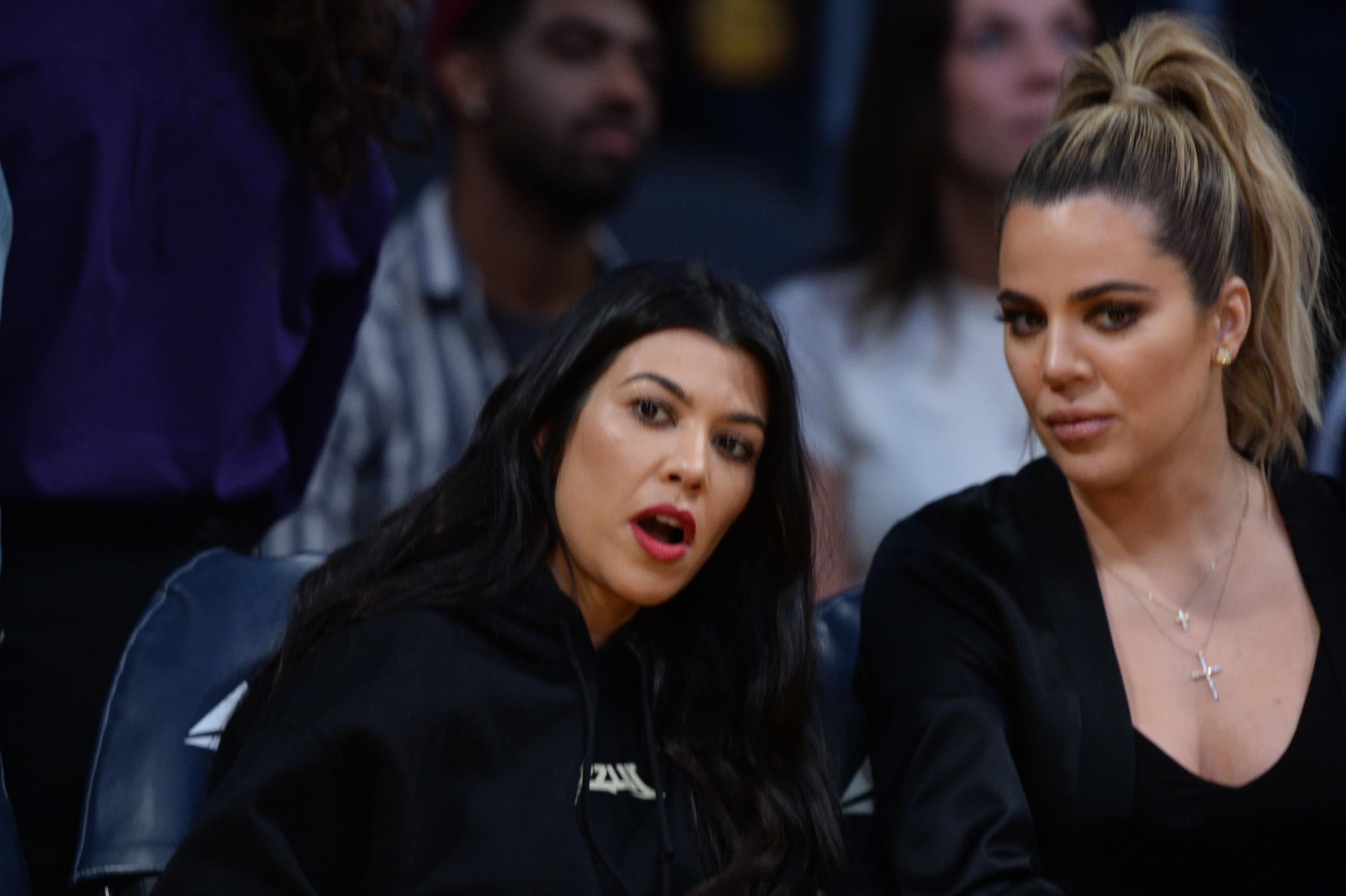 Kourtney & Khloe Kardashian attend LA Lakers vs Cavaliers Game