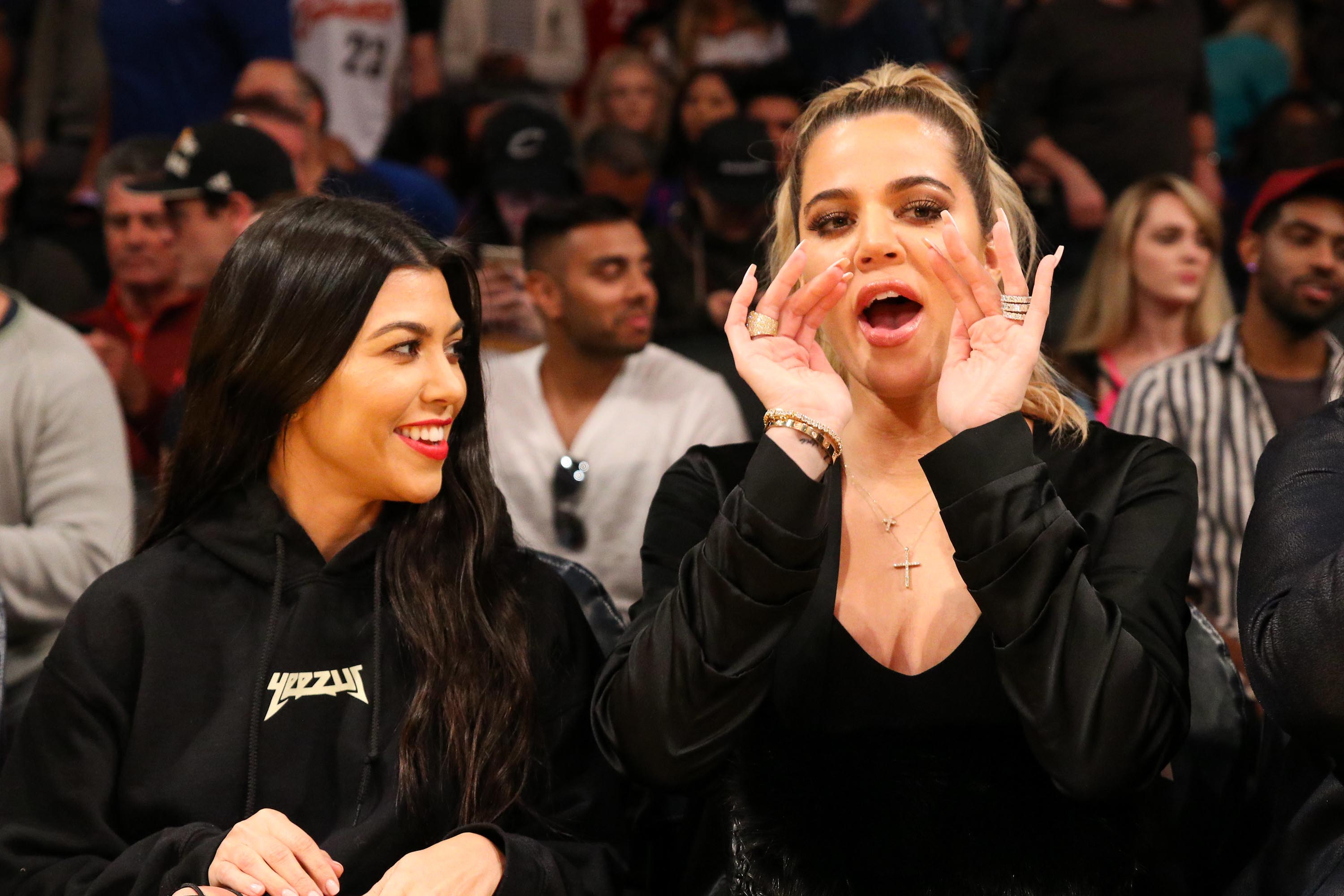 Kourtney & Khloe Kardashian attend LA Lakers vs Cavaliers Game