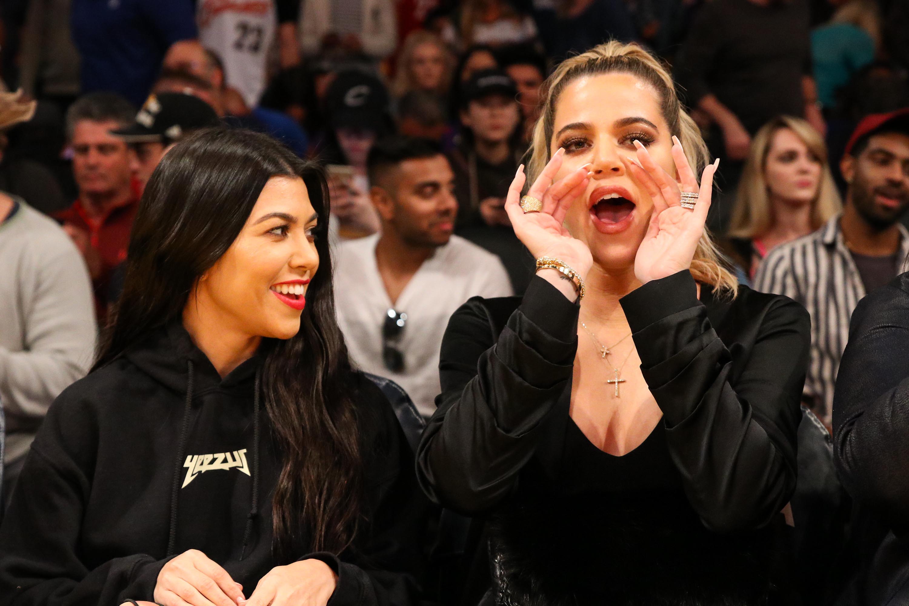 Kourtney & Khloe Kardashian attend LA Lakers vs Cavaliers Game