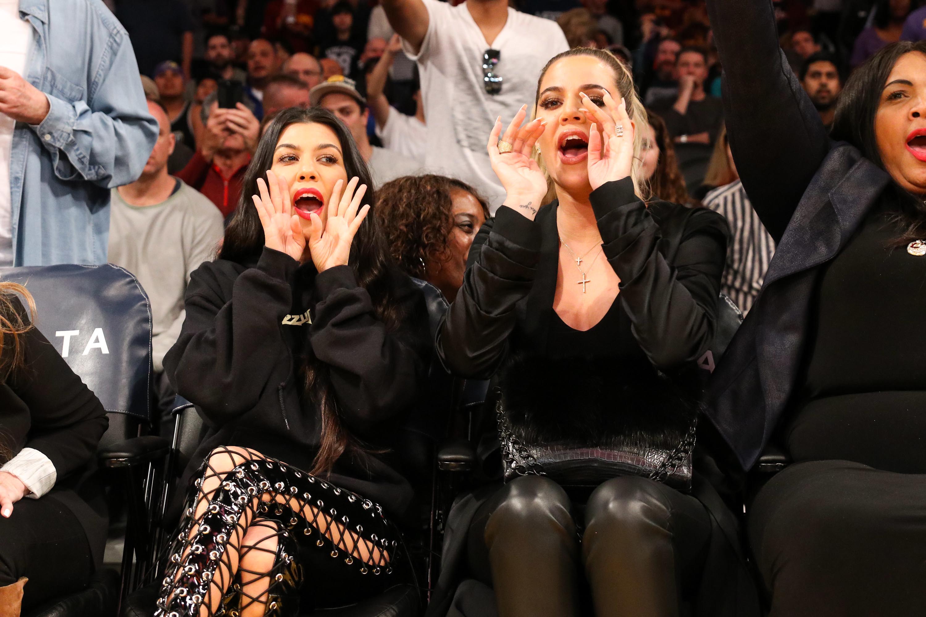 Kourtney & Khloe Kardashian attend LA Lakers vs Cavaliers Game