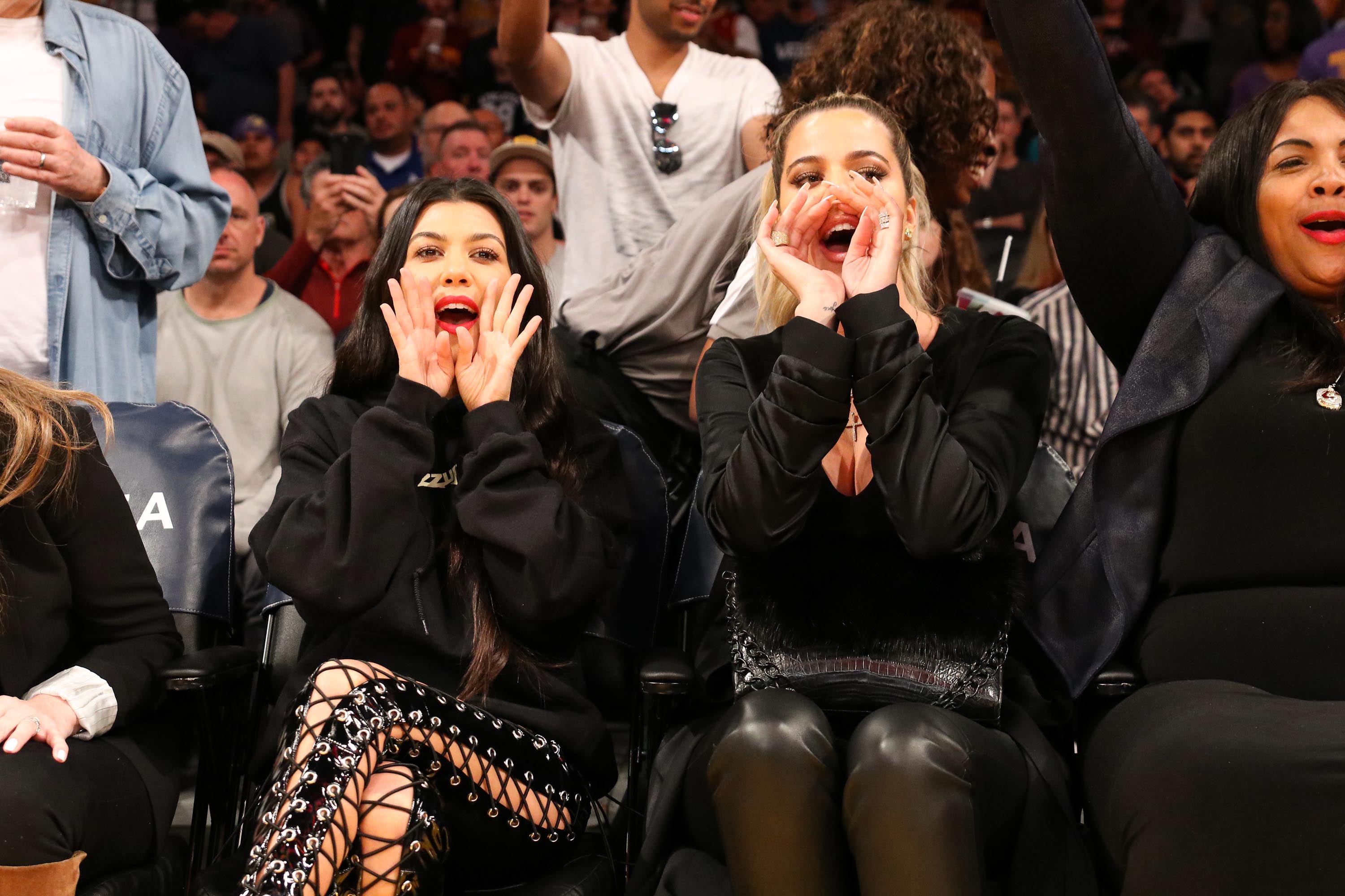 Kourtney & Khloe Kardashian attend LA Lakers vs Cavaliers Game