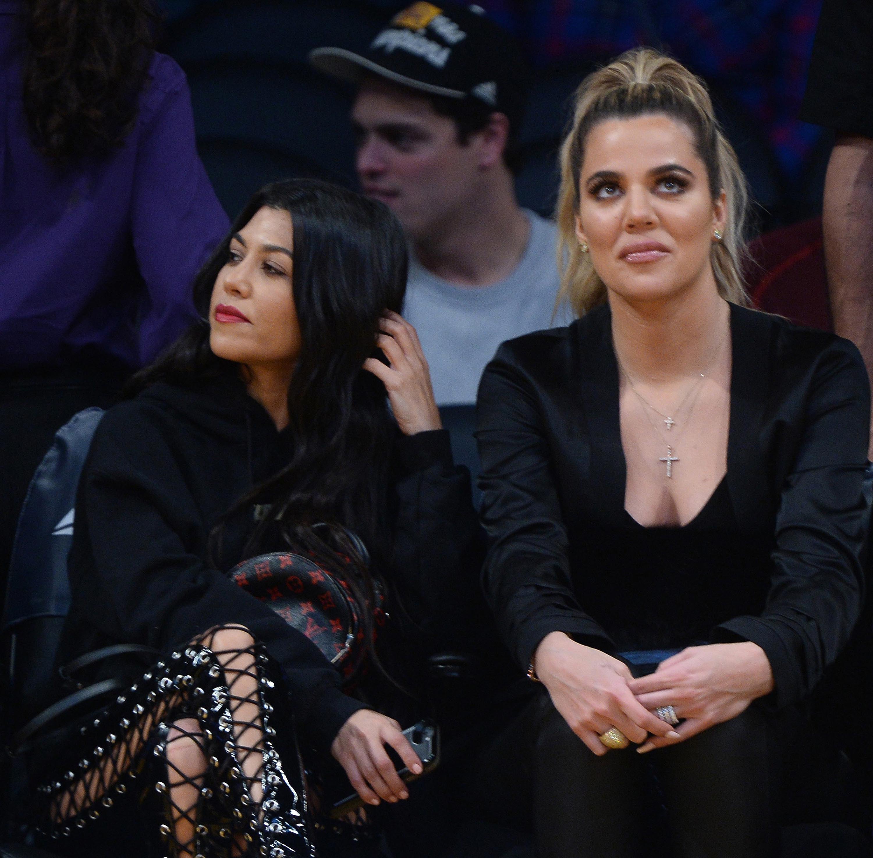 Kourtney & Khloe Kardashian attend LA Lakers vs Cavaliers Game