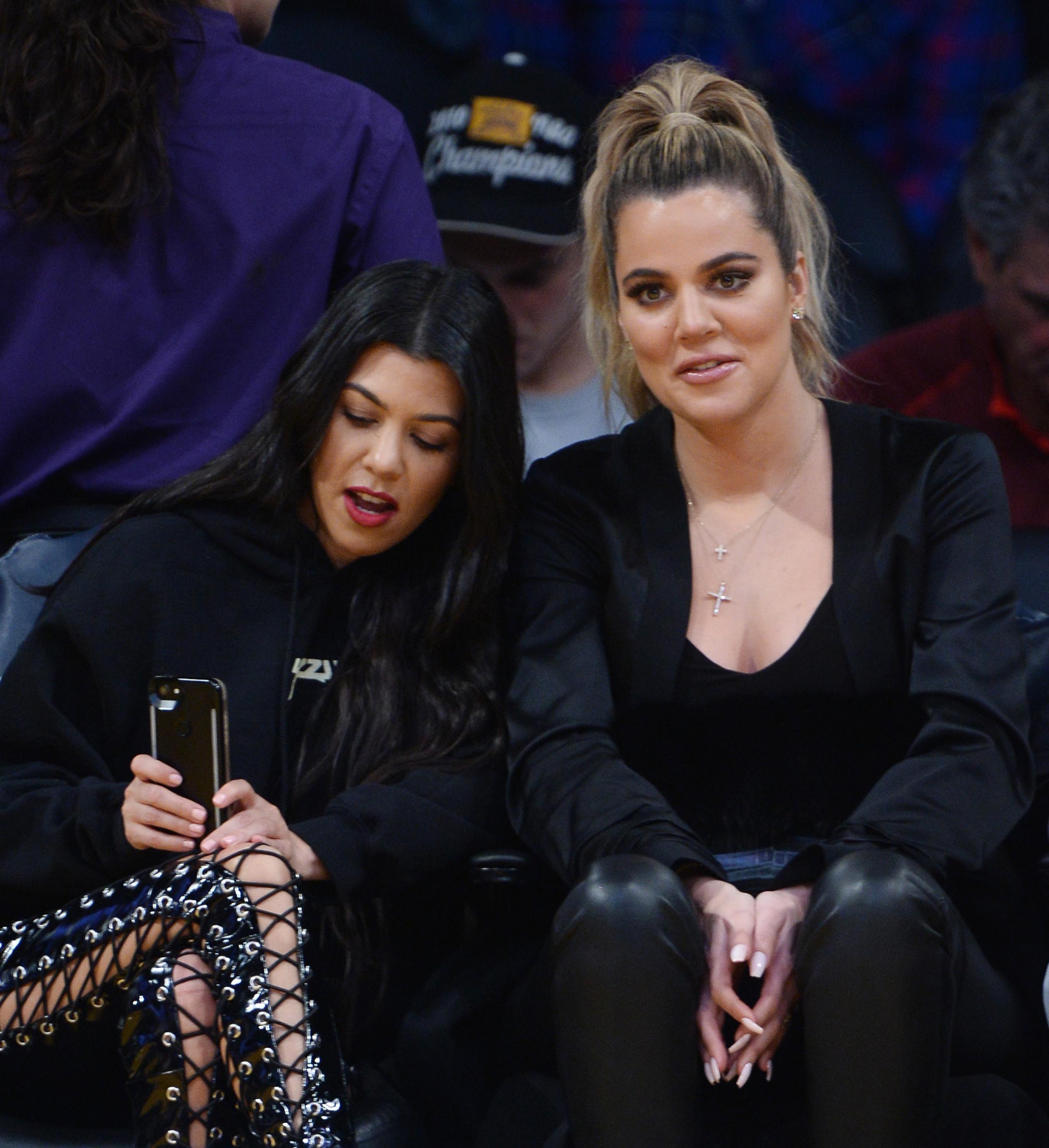 Kourtney & Khloe Kardashian attend LA Lakers vs Cavaliers Game