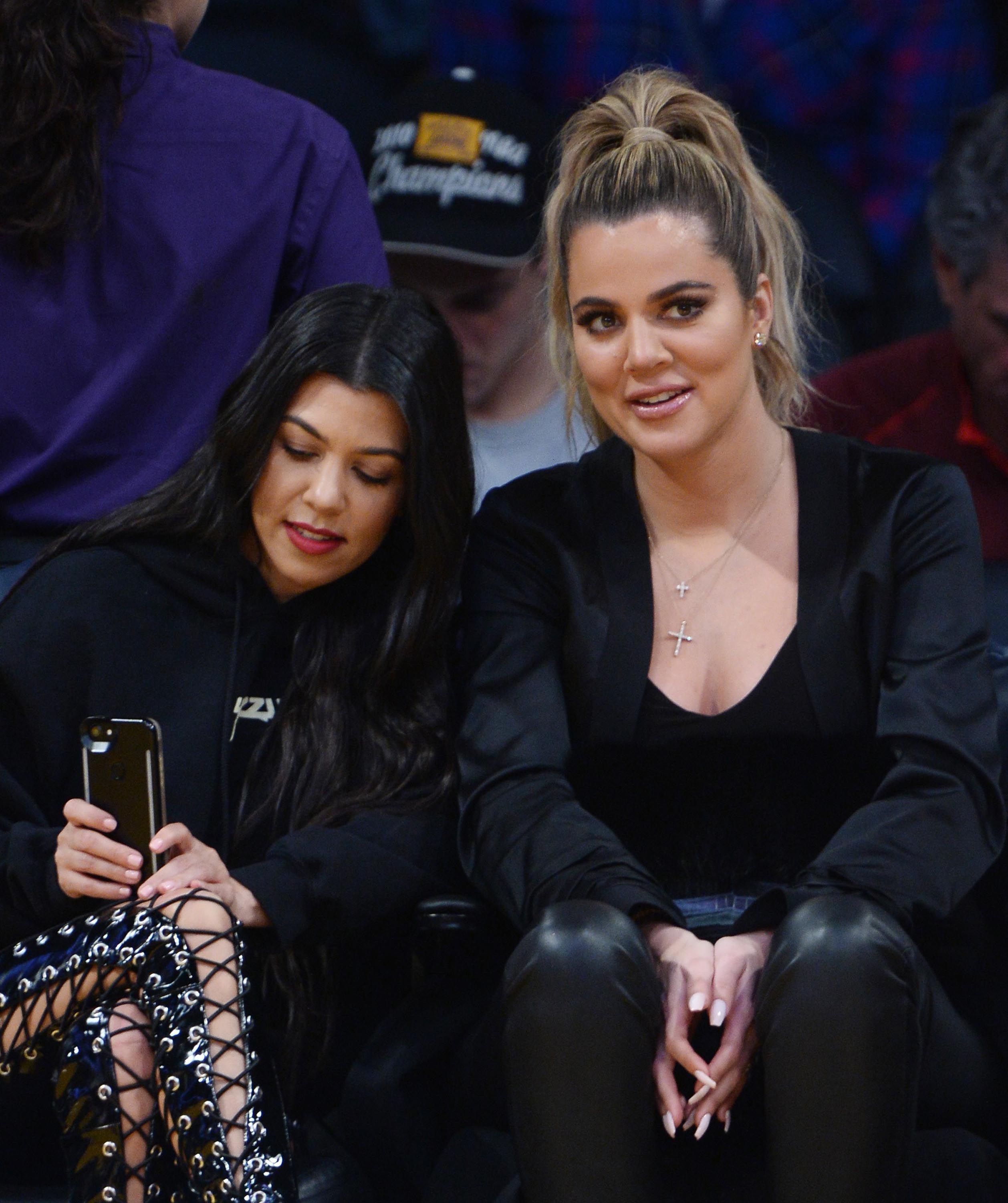 Kourtney & Khloe Kardashian attend LA Lakers vs Cavaliers Game