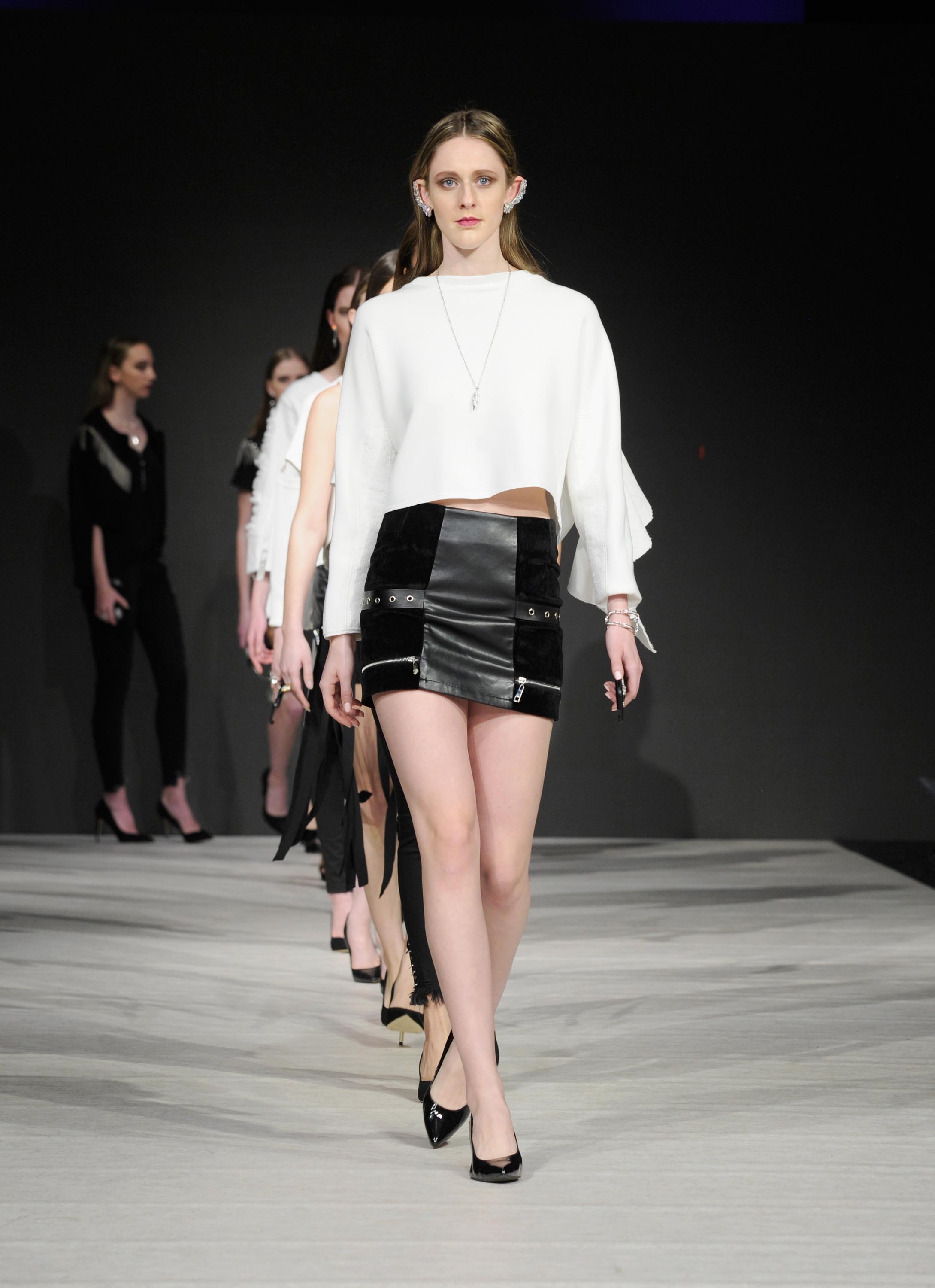 Models walk the runway at Vancouver Fashion Week