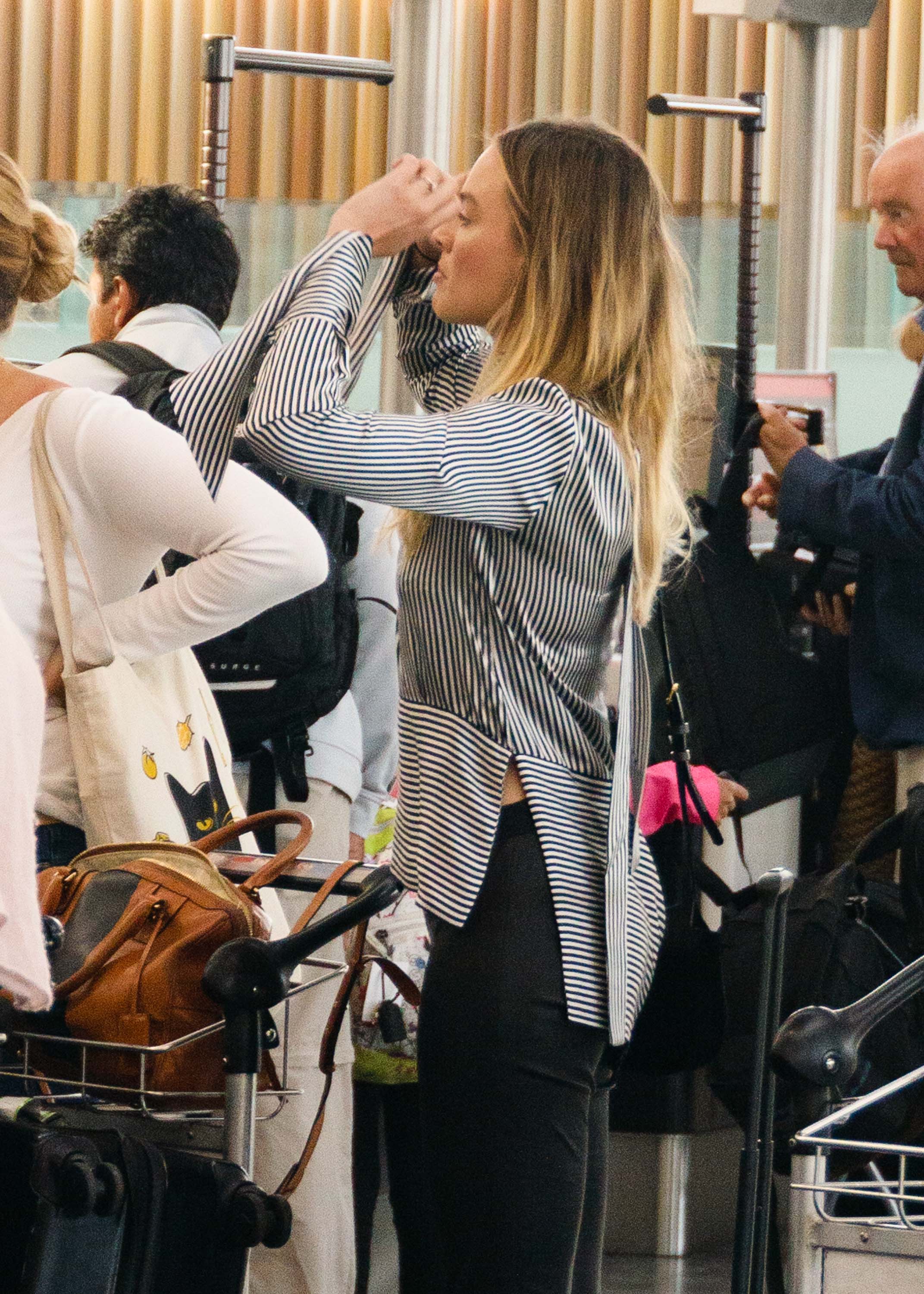 Margot Robbie seen at Heathrow airport