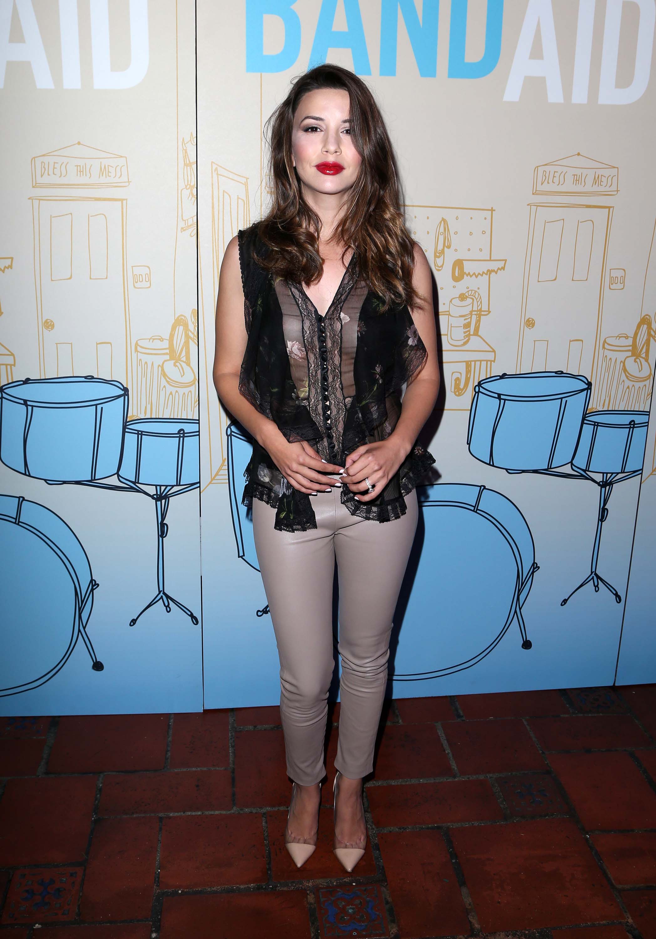 Masiela Lusha attends Band Aid Premiere