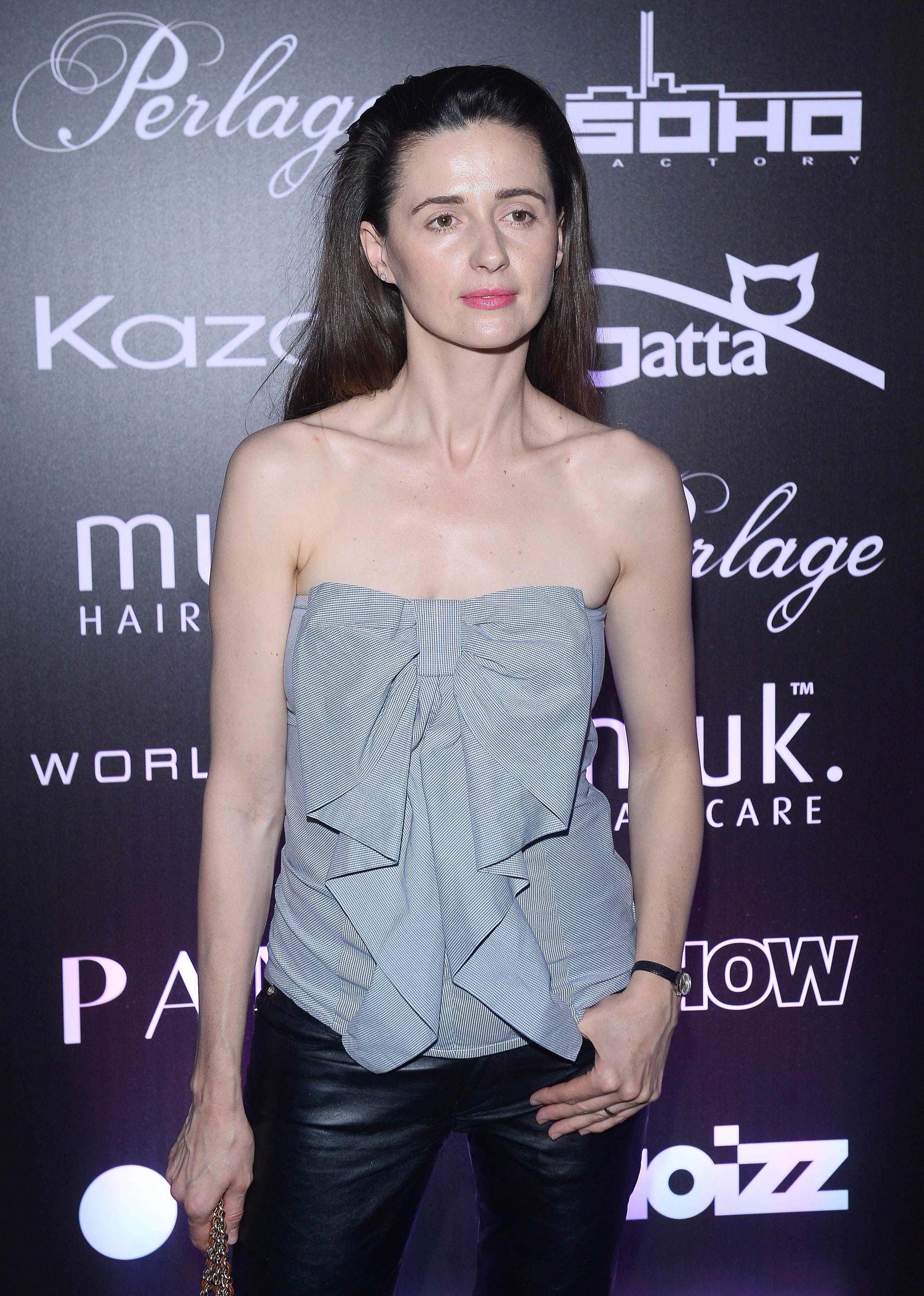 Agnieszka Grochowska attends the Pokaz Roberta Kupisza Fashion Show