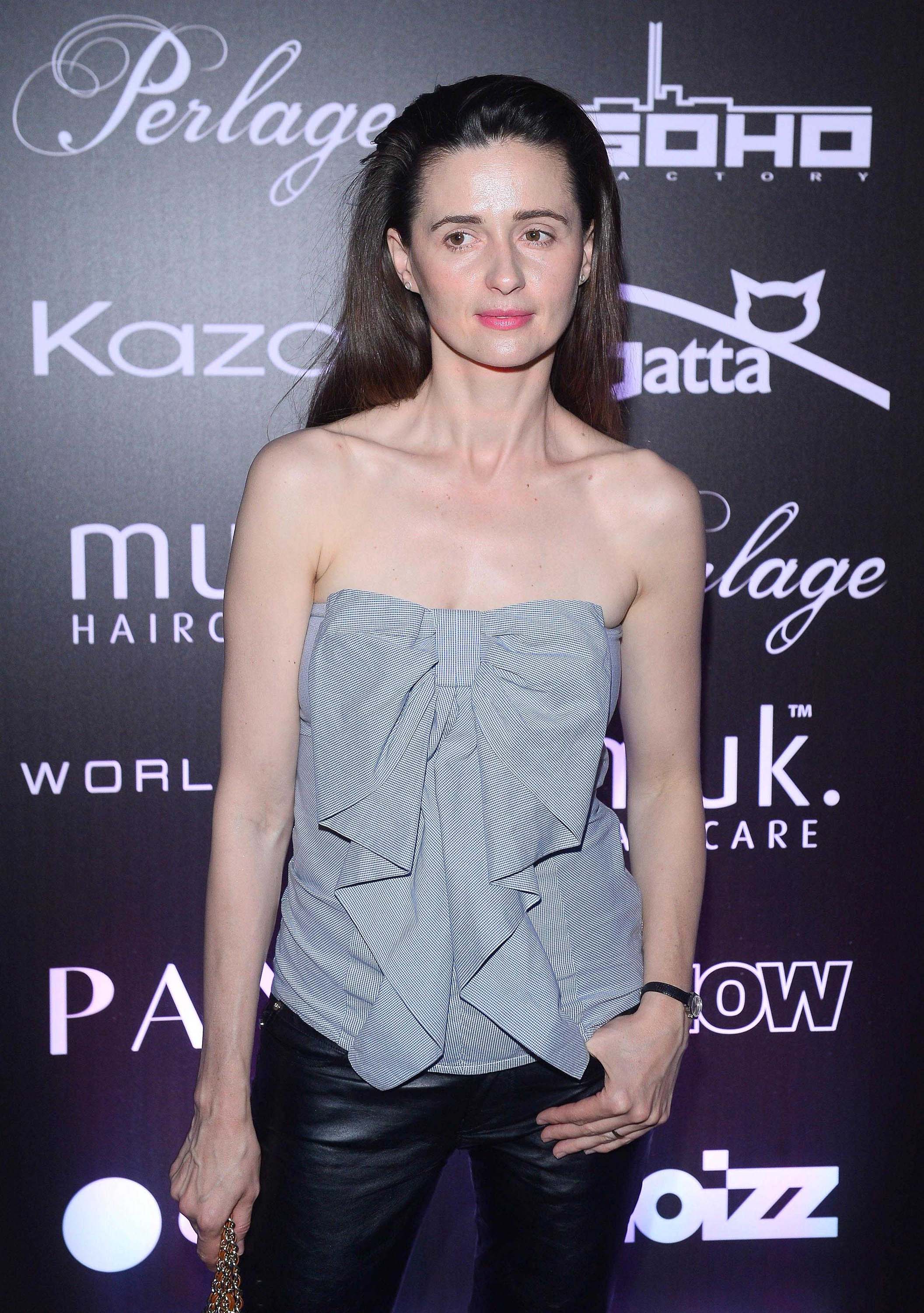 Agnieszka Grochowska attends the Pokaz Roberta Kupisza Fashion Show