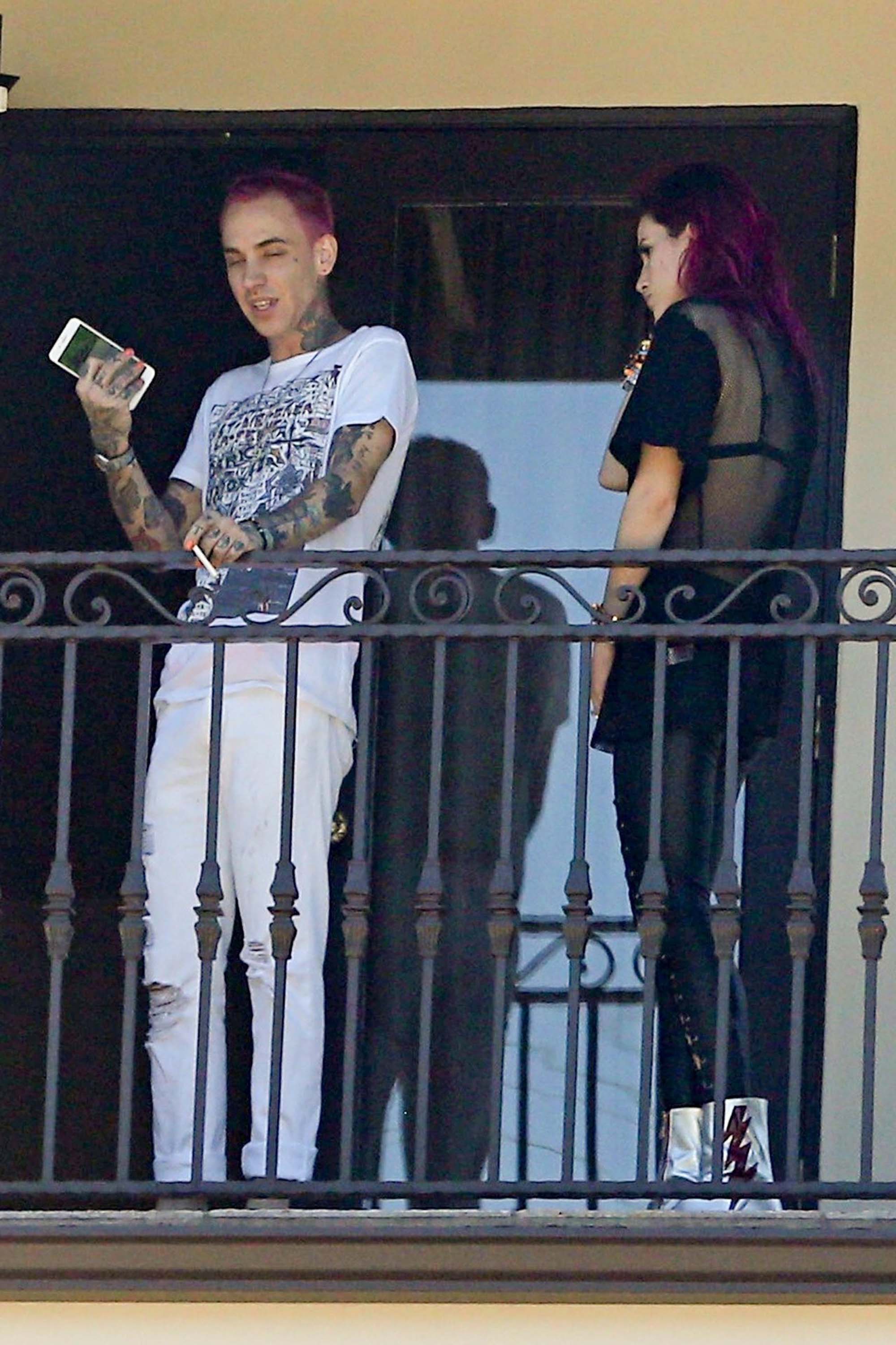 Bella Thorne seen on the balcony of hotel room