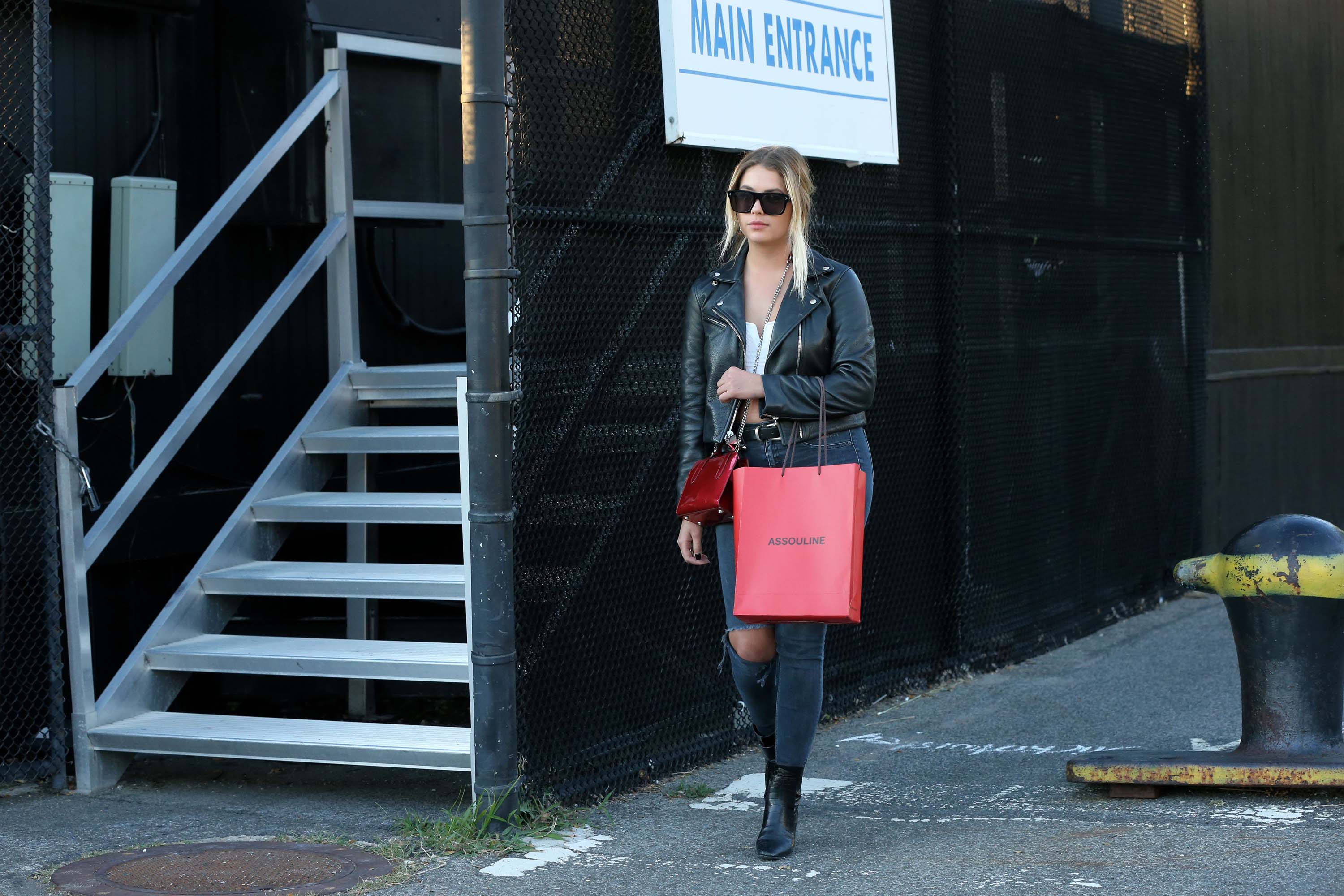 Ashley Benson at a heliport in NYC