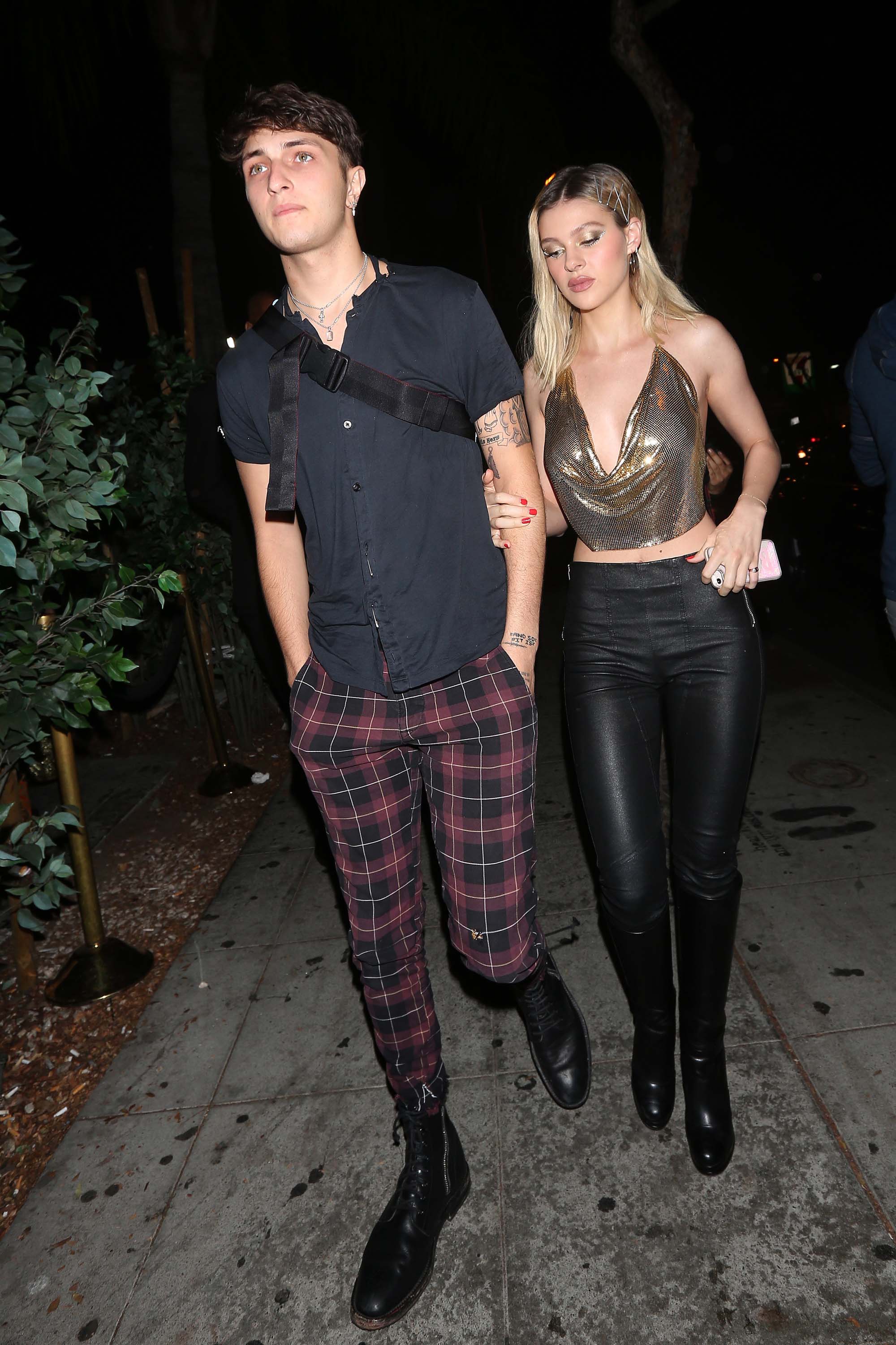 Nicola Peltz attends a Halloween party