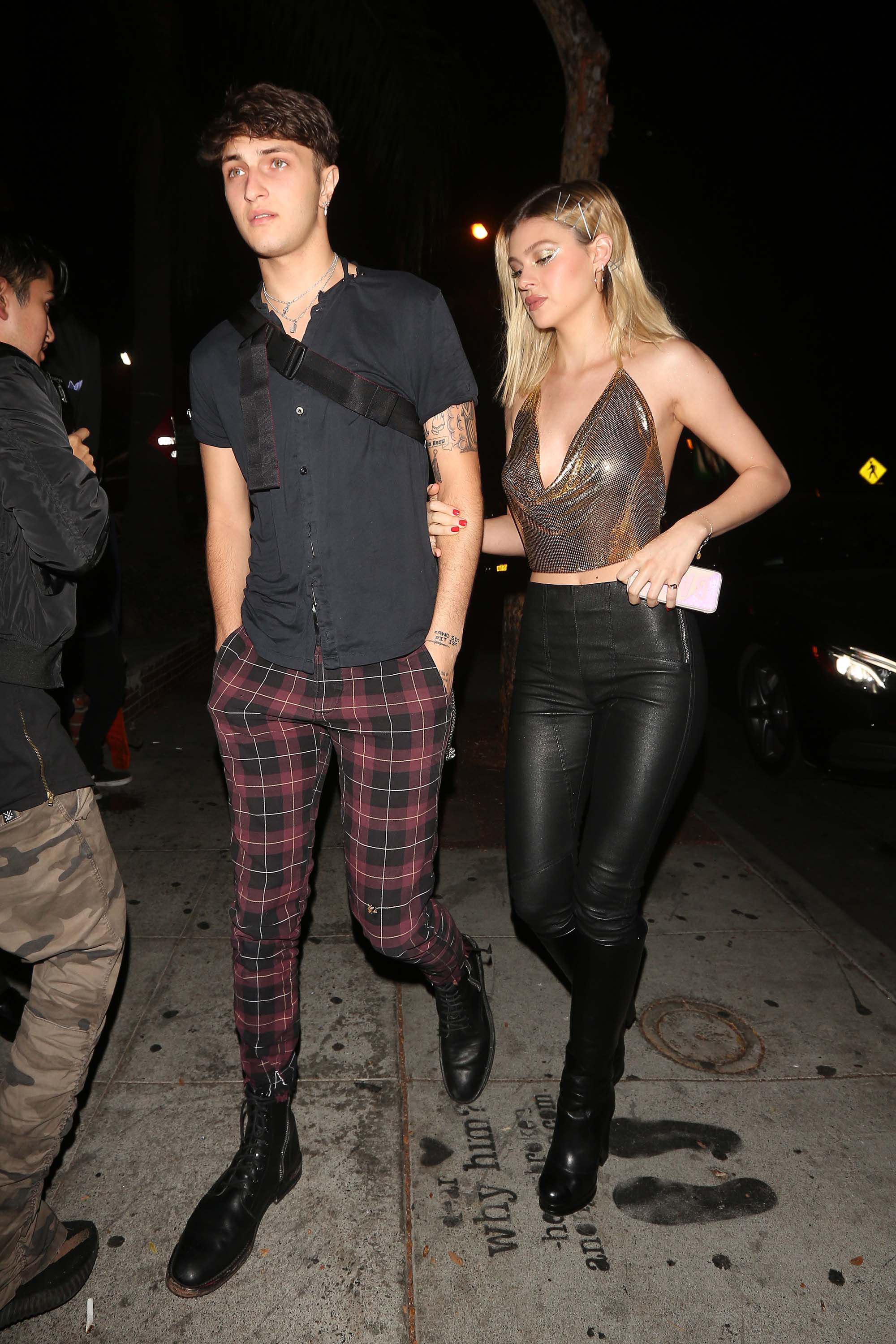 Nicola Peltz attends a Halloween party