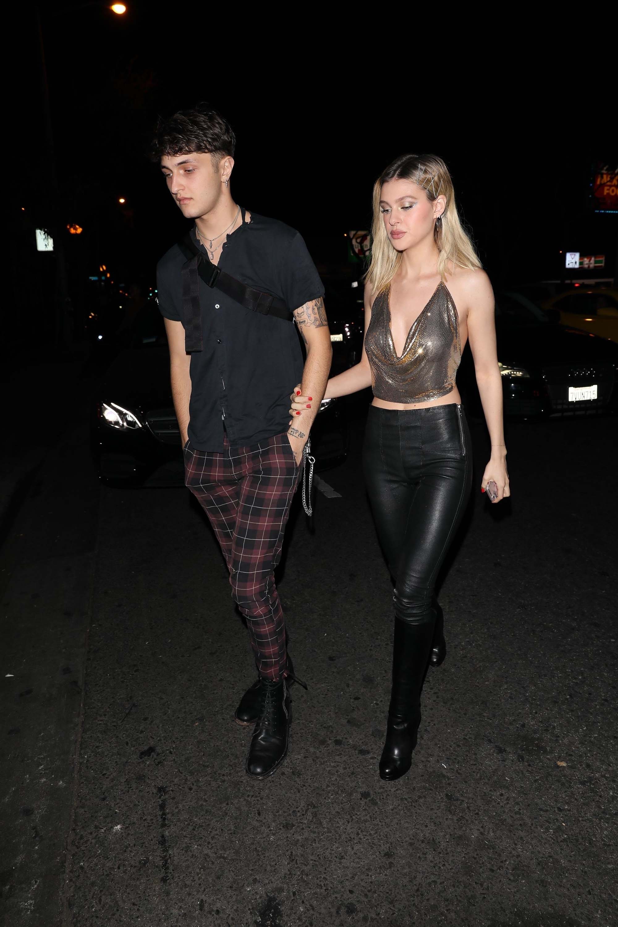 Nicola Peltz attends a Halloween party