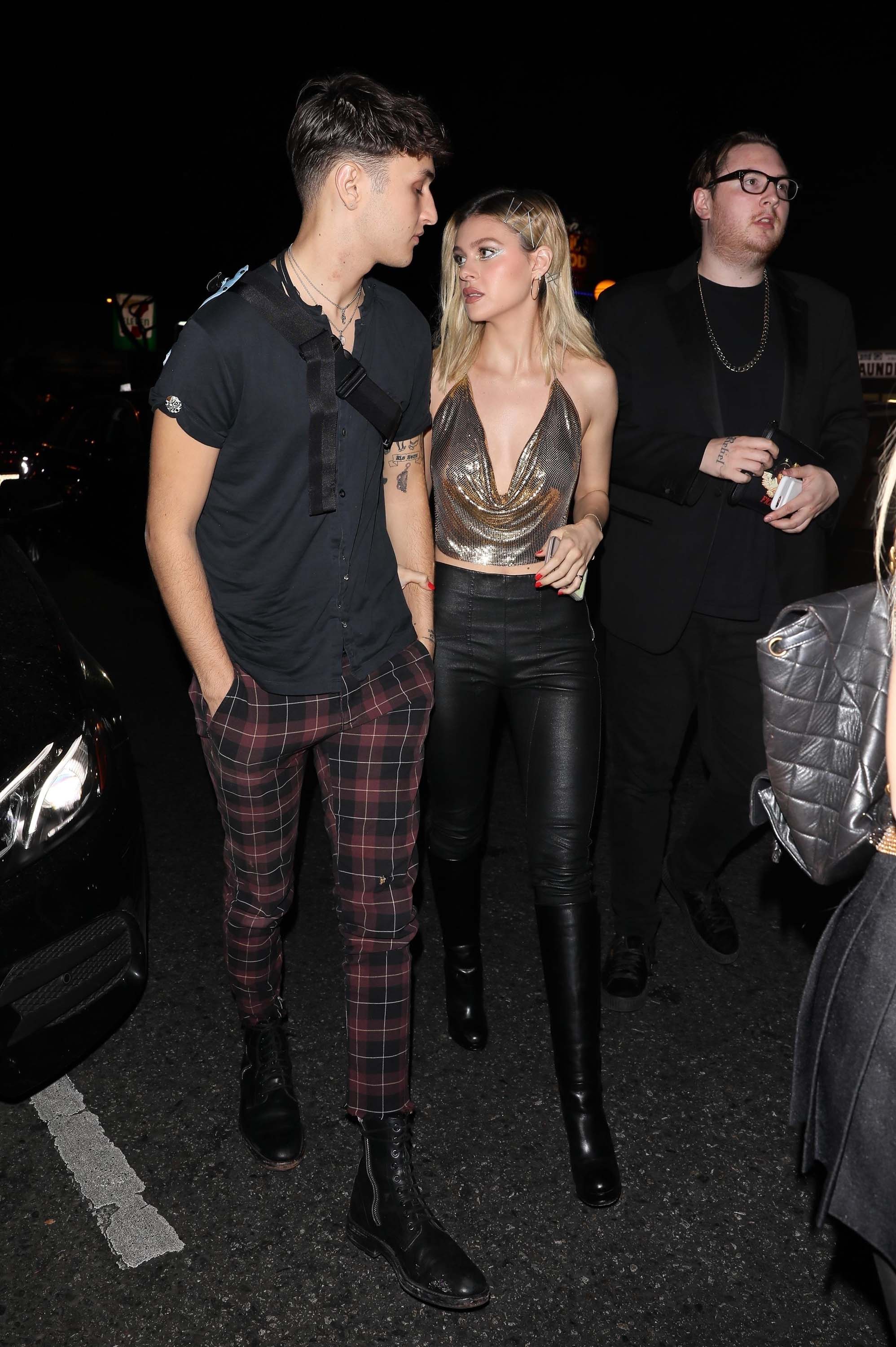 Nicola Peltz attends a Halloween party